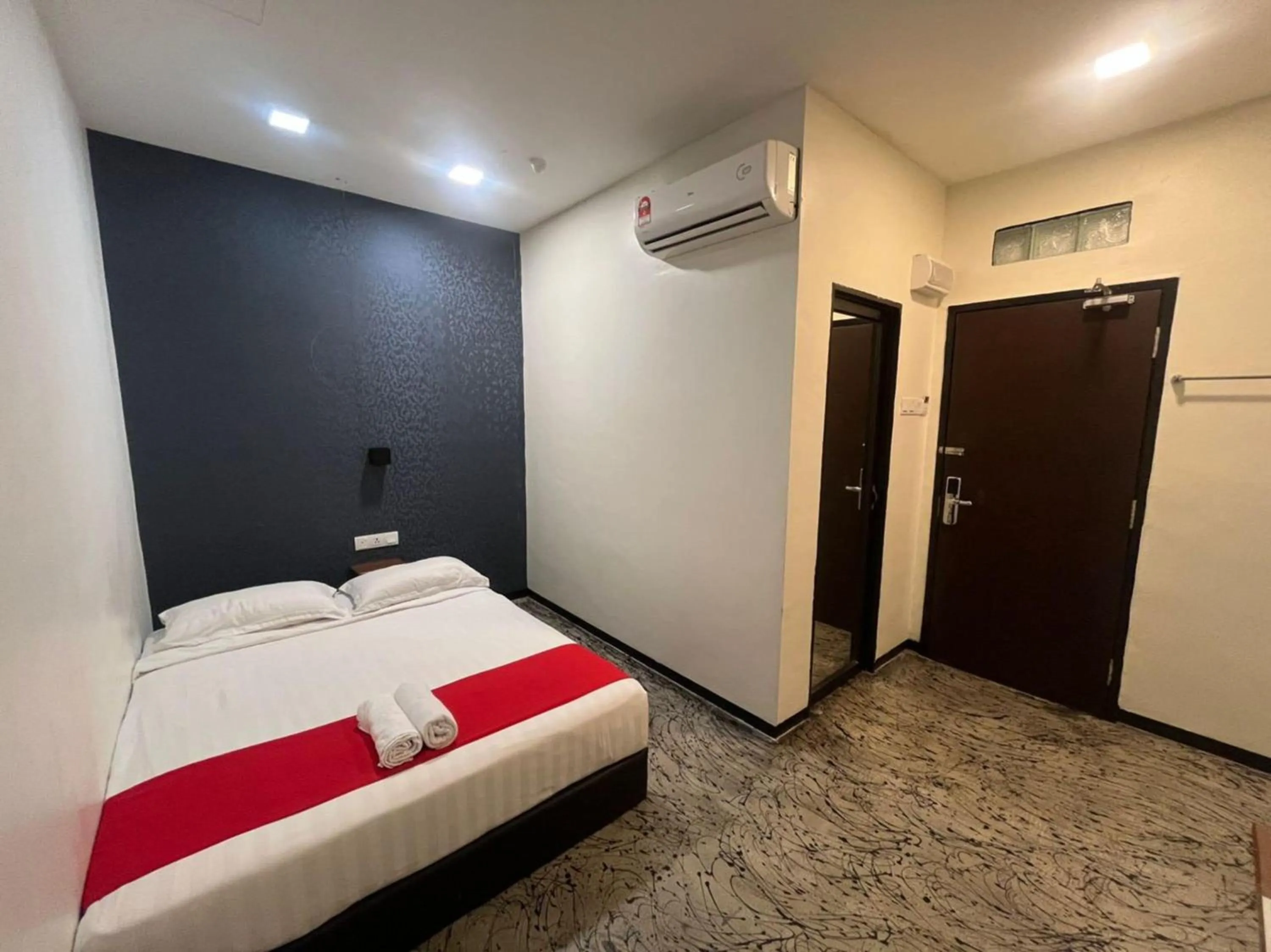 Bedroom in Capital O 89333 Musse Hotel