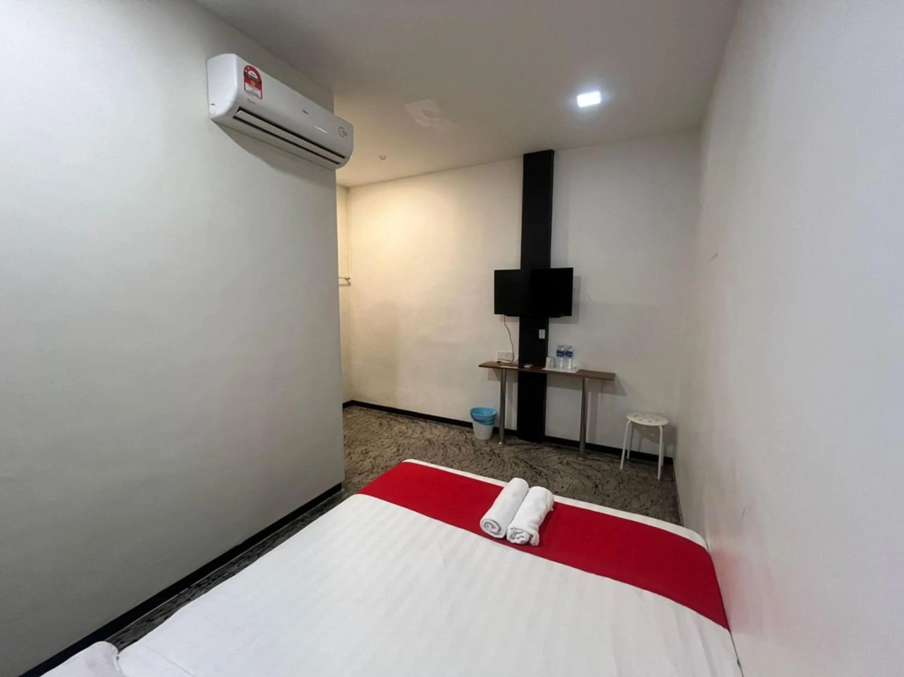 Bedroom in Capital O 89333 Musse Hotel