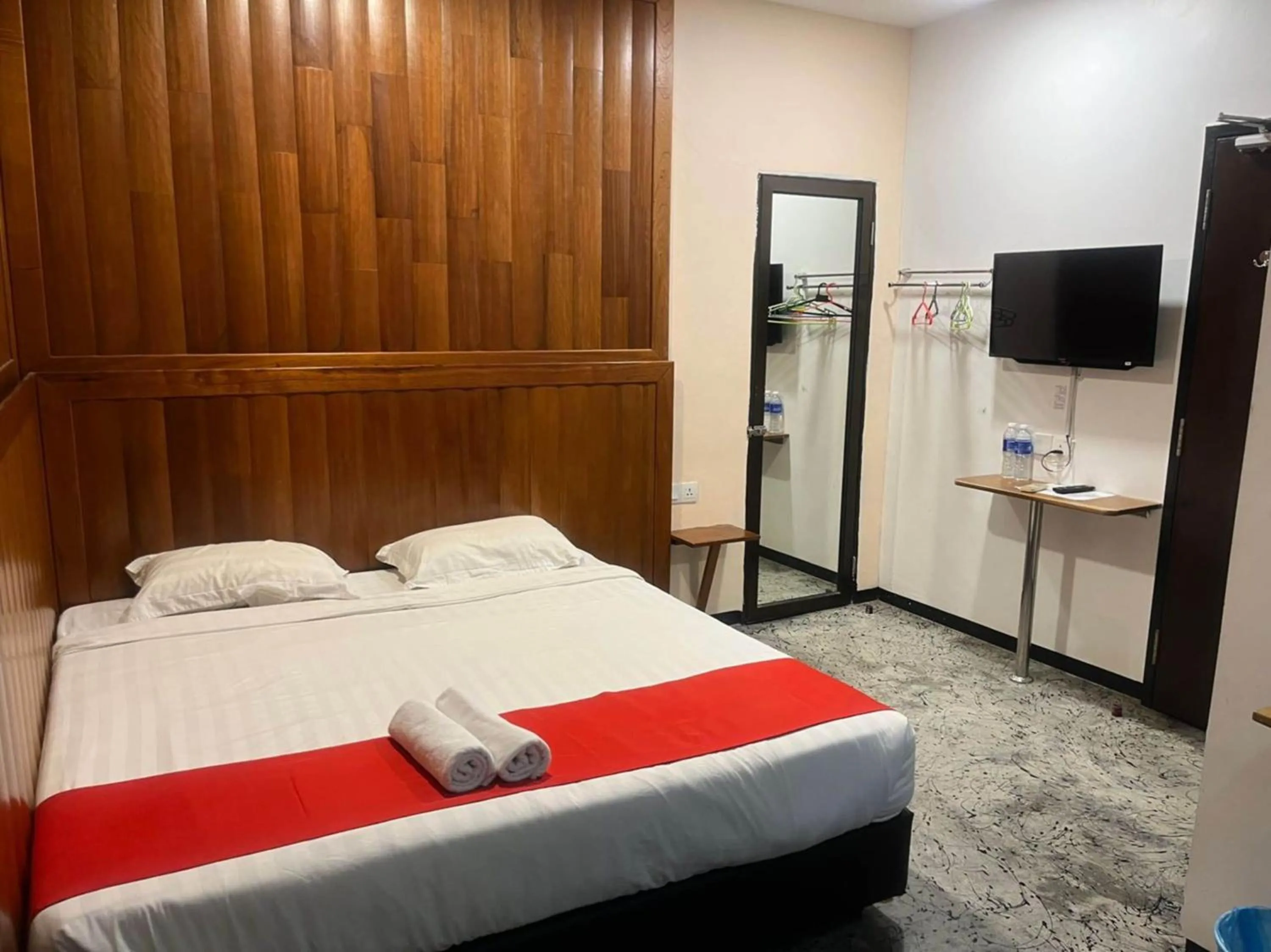 Bedroom in Capital O 89333 Musse Hotel