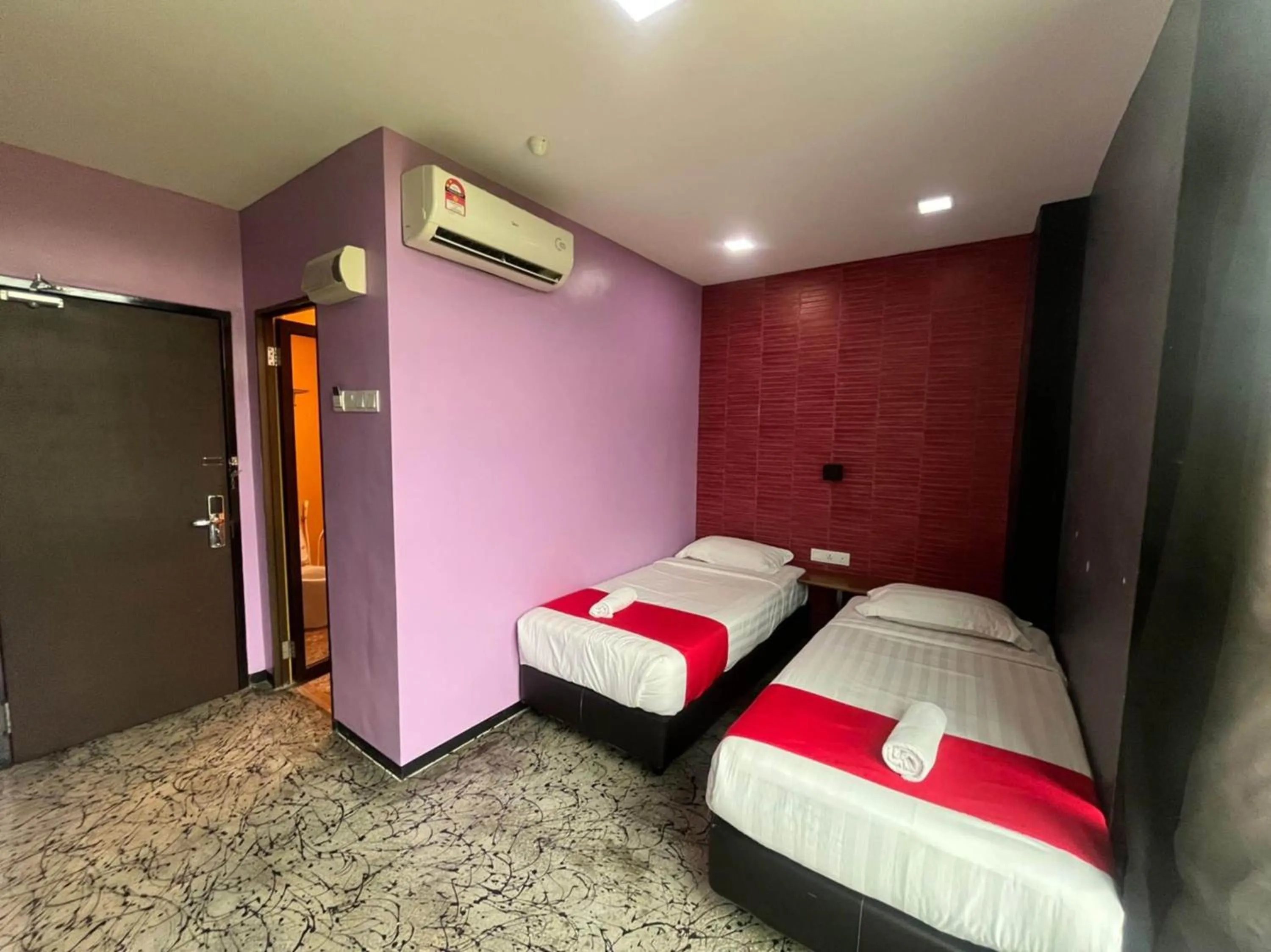 Bedroom in Capital O 89333 Musse Hotel