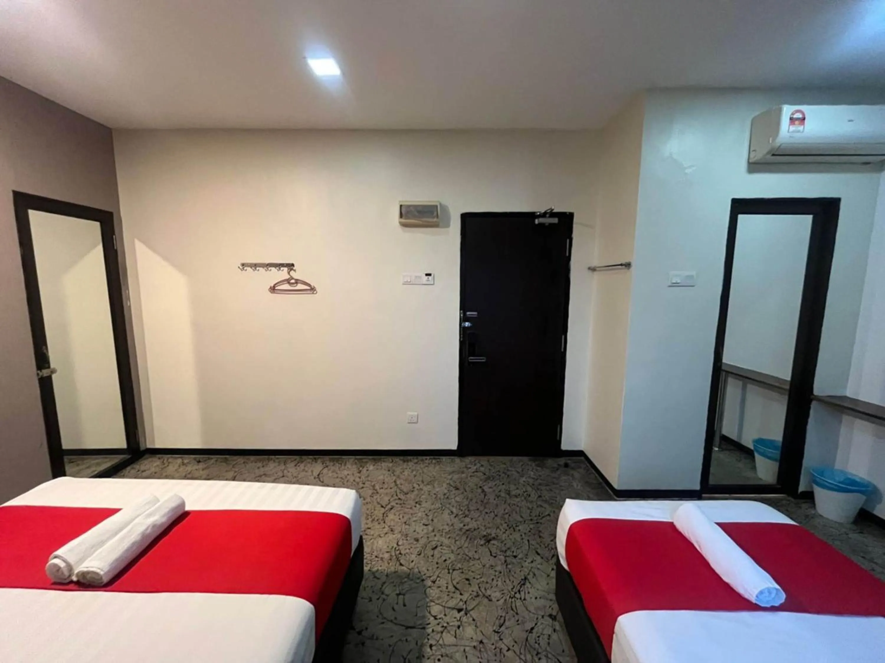 Bedroom in Capital O 89333 Musse Hotel