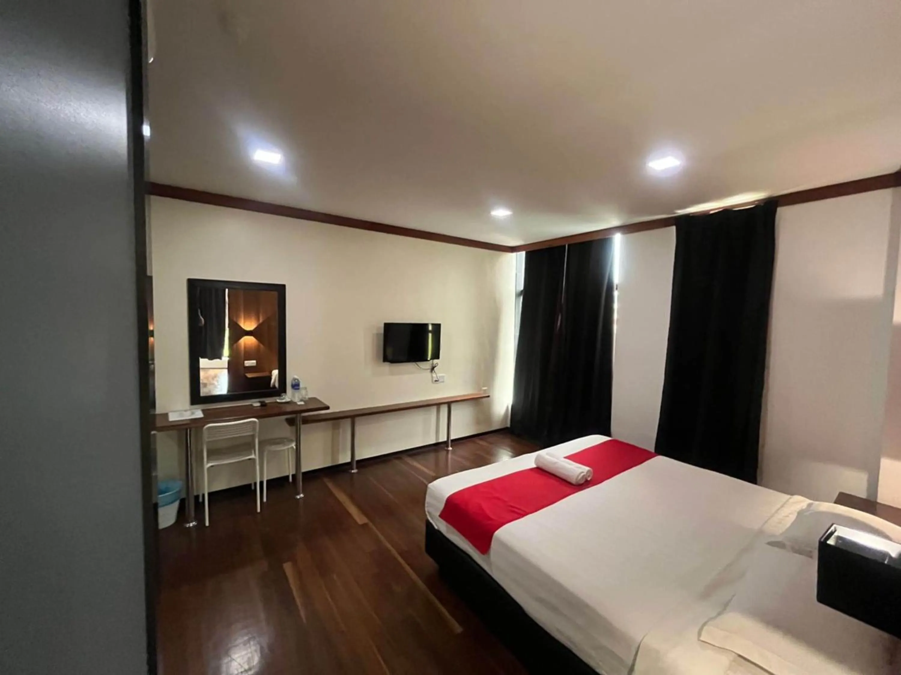 Bedroom in Capital O 89333 Musse Hotel