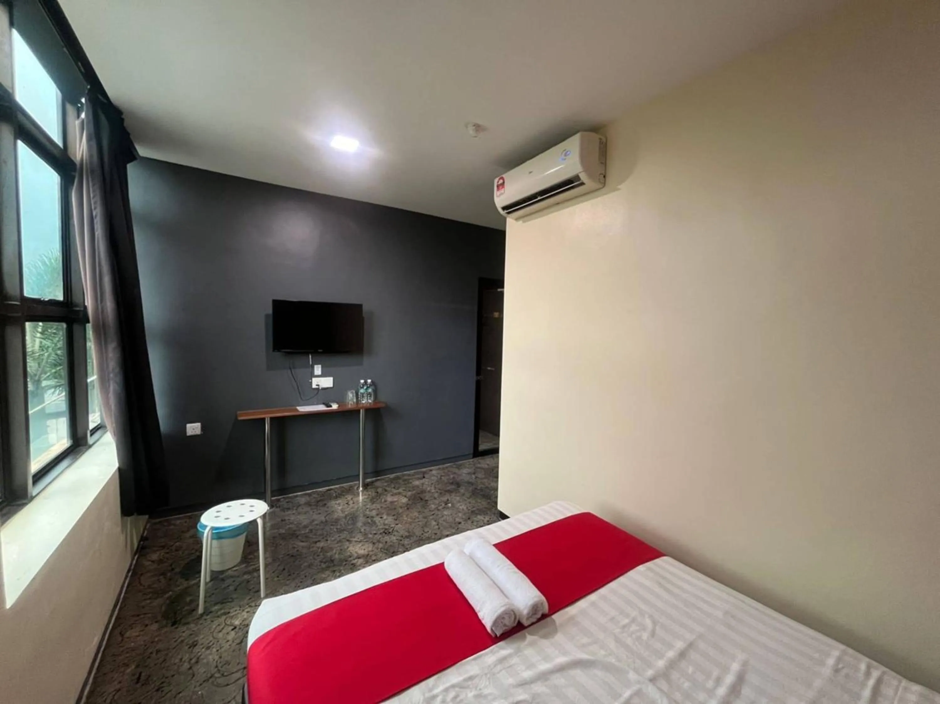 Bedroom in Capital O 89333 Musse Hotel