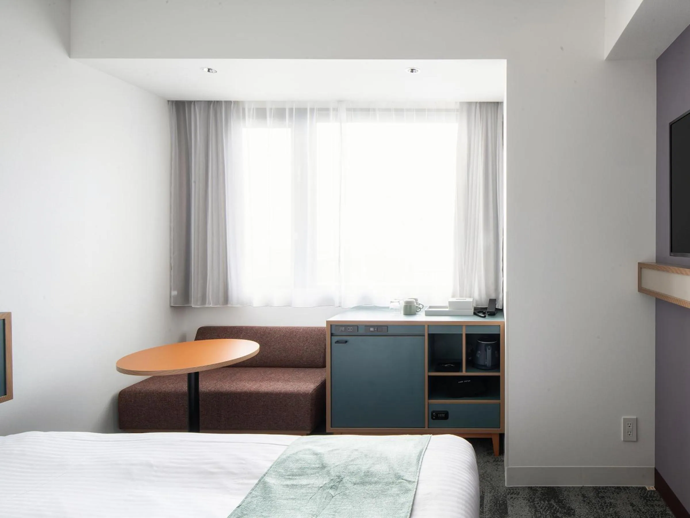 Bed in REF Okinawa Arena by VESSEL HOTELS