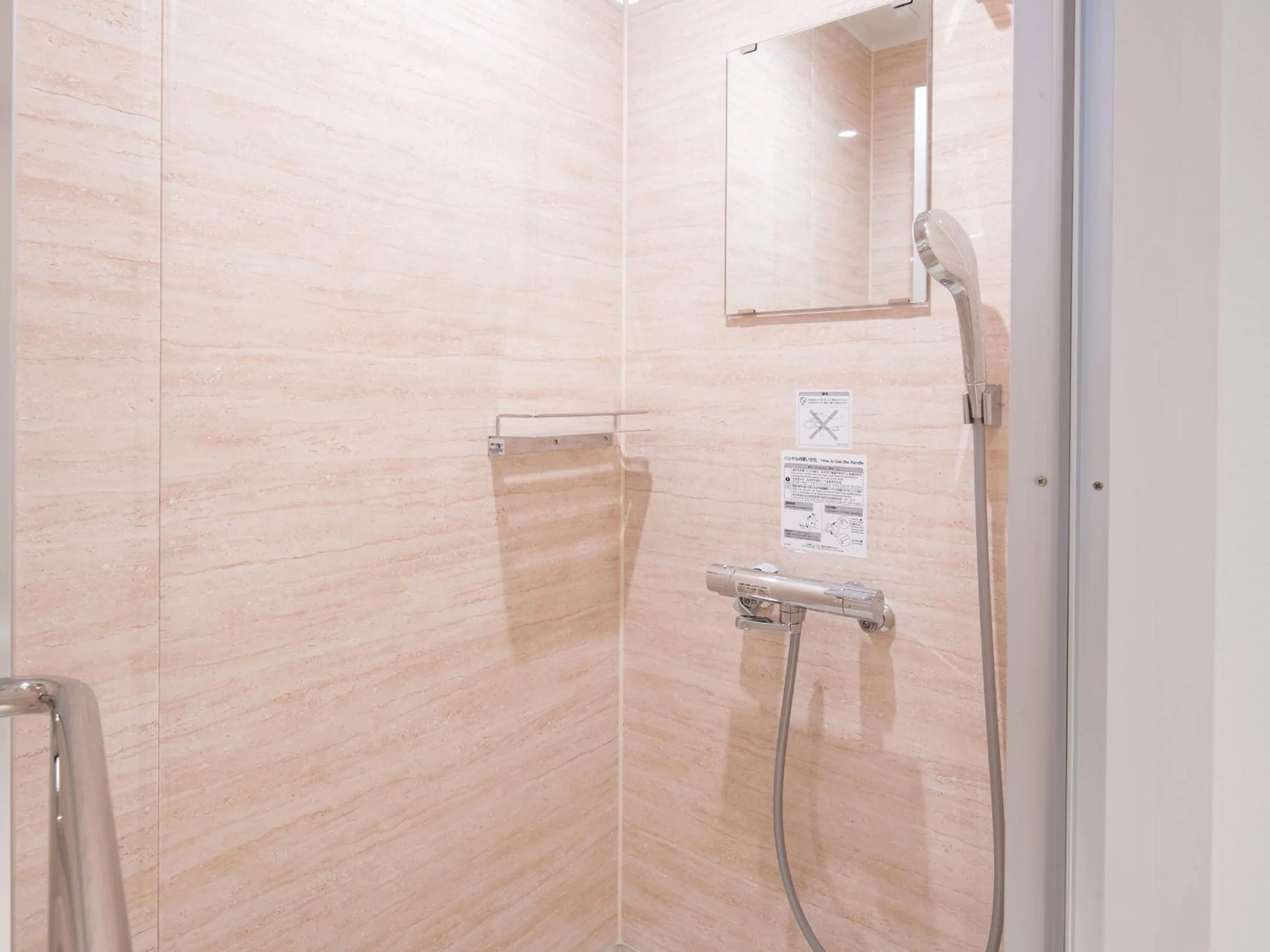 Shower in REF Okinawa Arena by VESSEL HOTELS