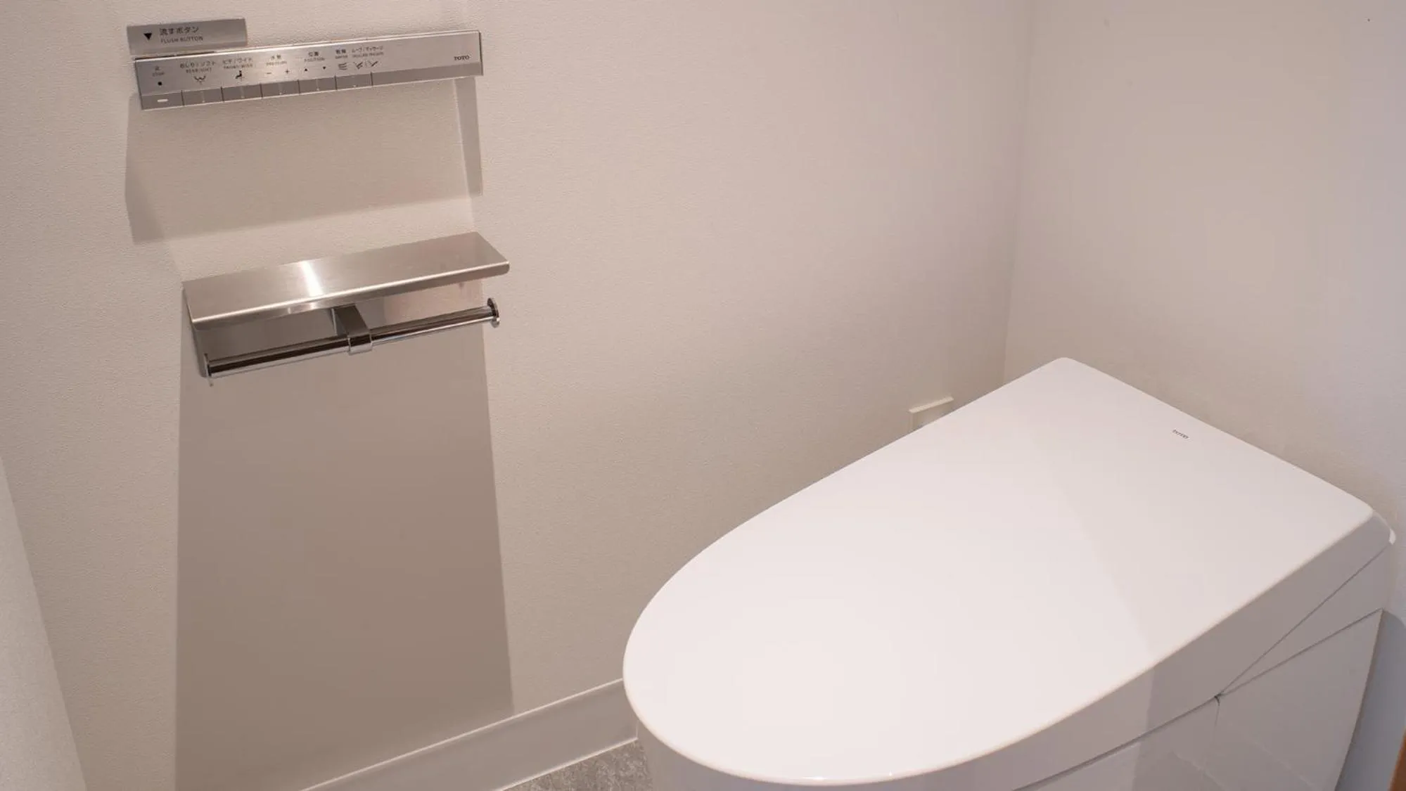Toilet in REF Okinawa Arena by VESSEL HOTELS