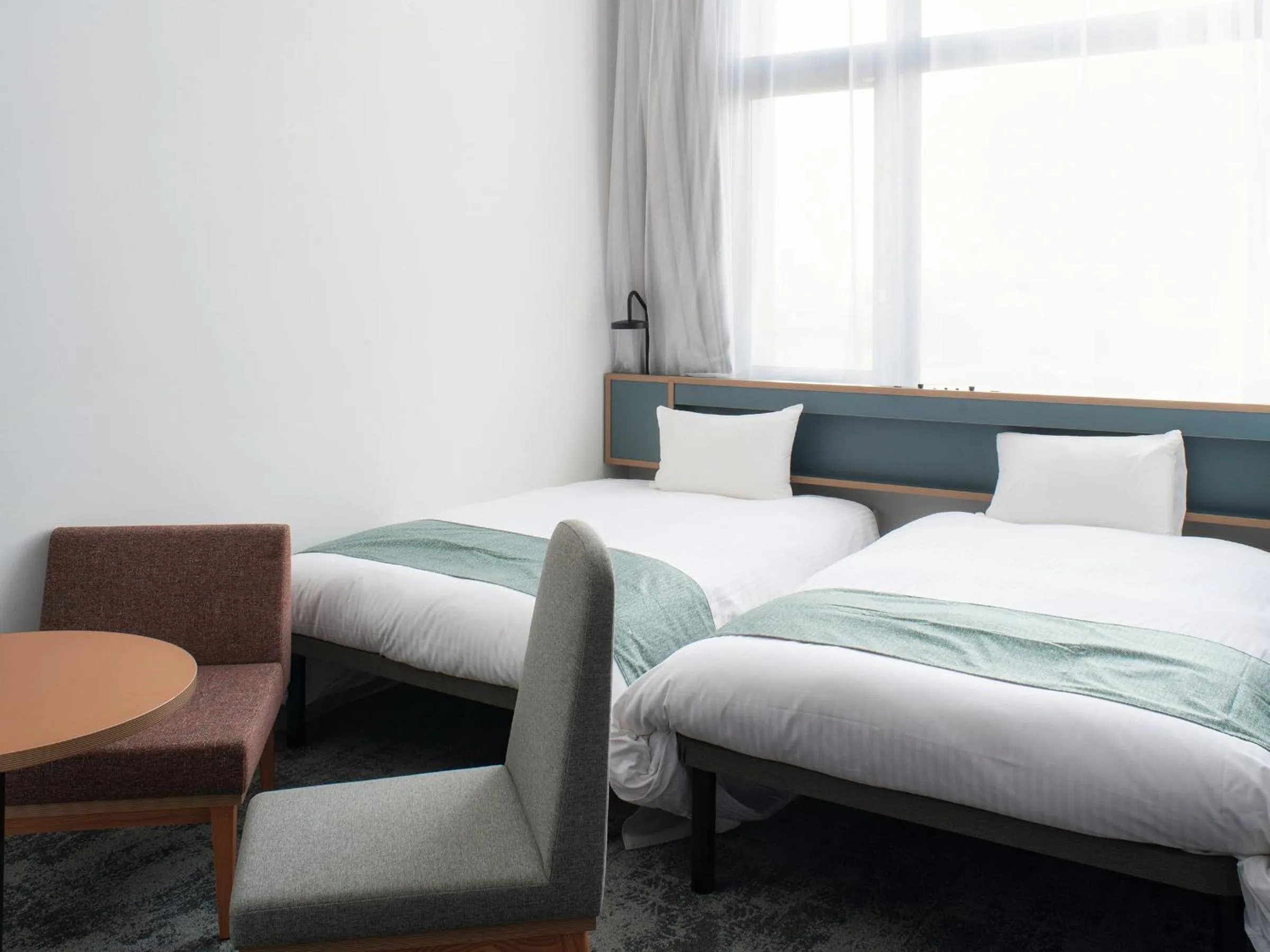 Bed in REF Okinawa Arena by VESSEL HOTELS