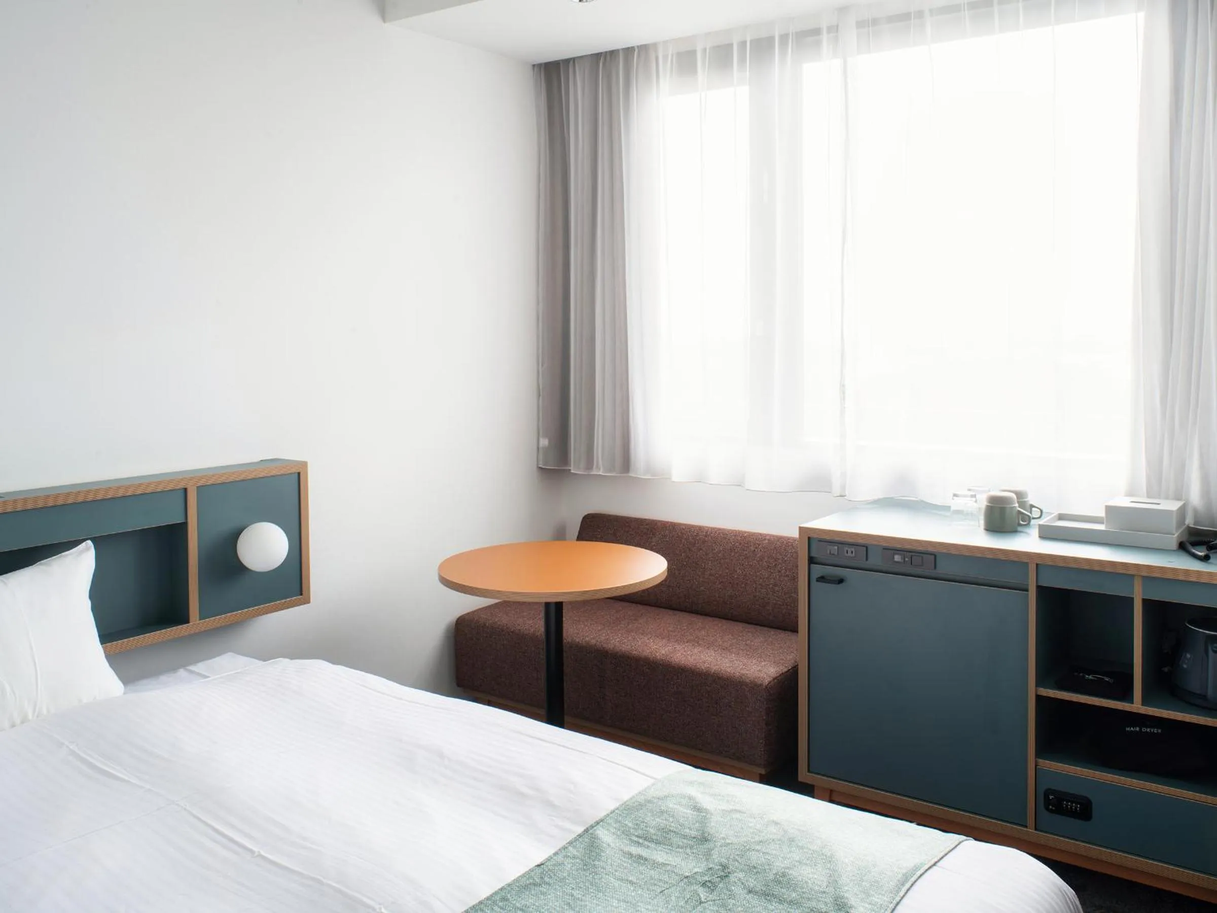 Bed in REF Okinawa Arena by VESSEL HOTELS