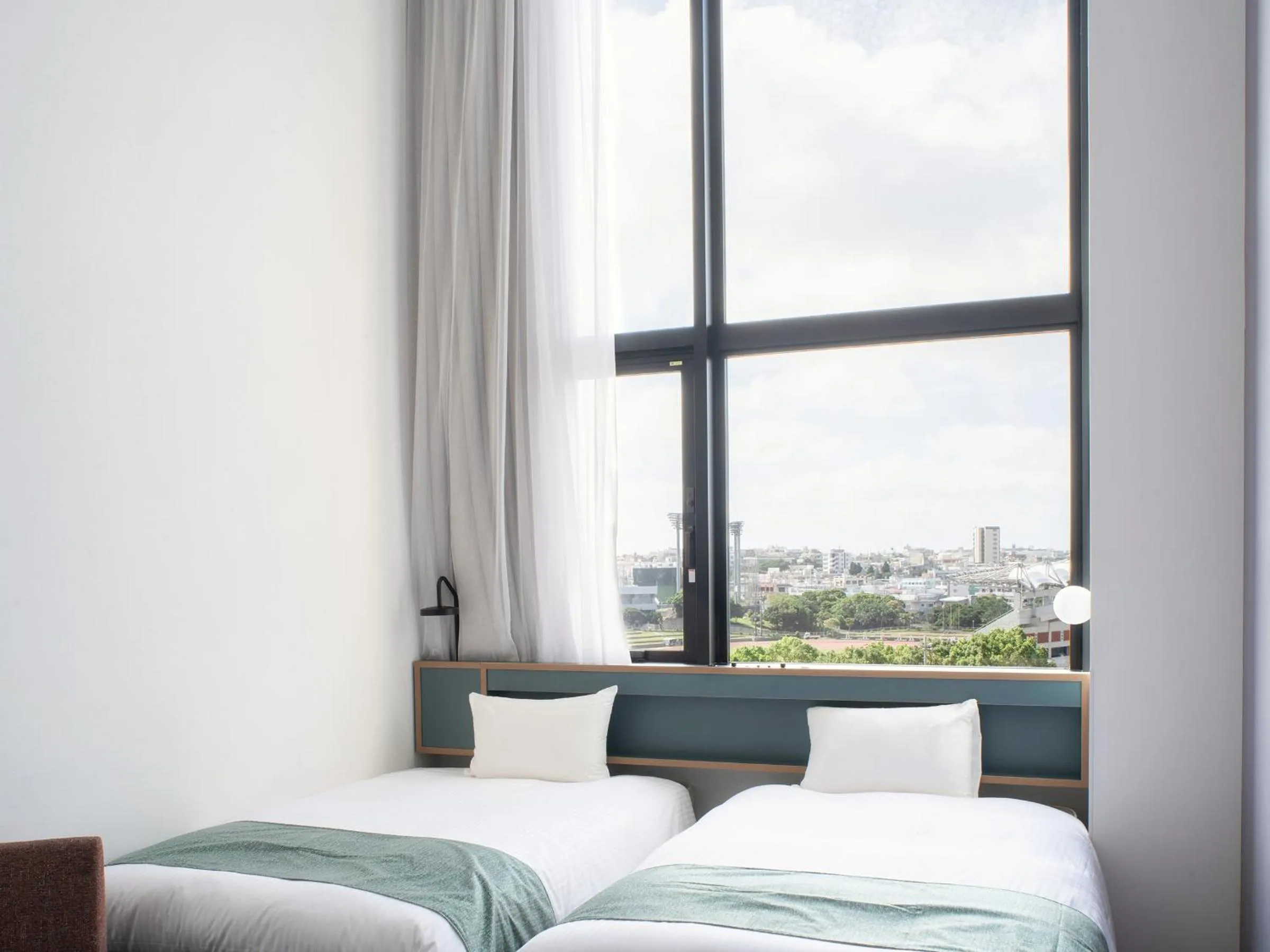 Photo of the whole room, Bed in REF Okinawa Arena by VESSEL HOTELS