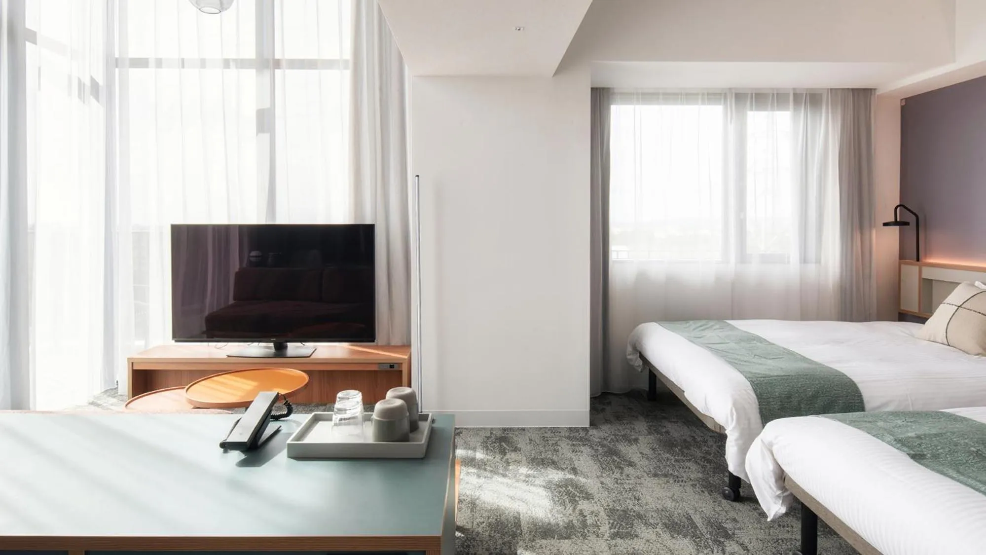 Bed in REF Okinawa Arena by VESSEL HOTELS