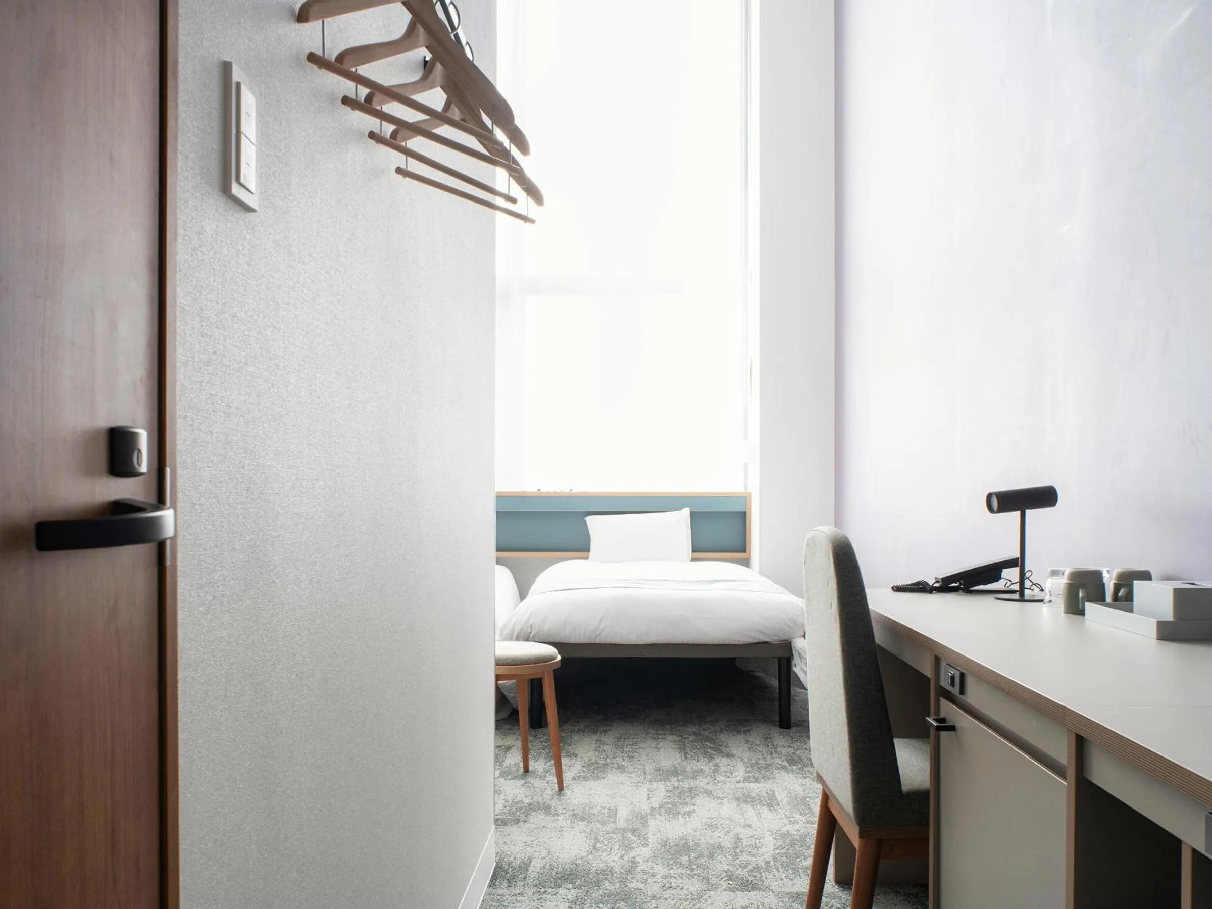 Bed in REF Okinawa Arena by VESSEL HOTELS