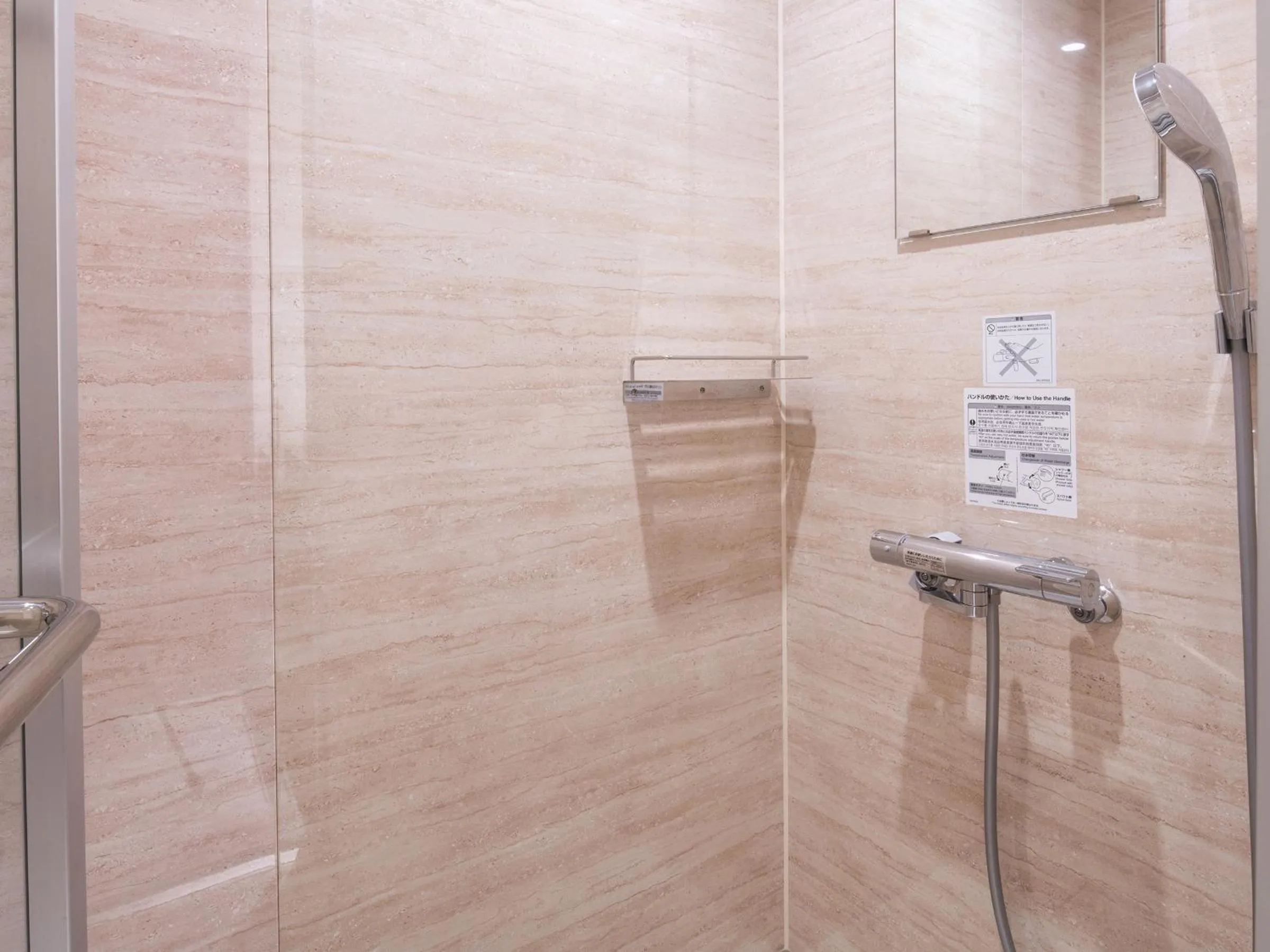 Shower in REF Okinawa Arena by VESSEL HOTELS