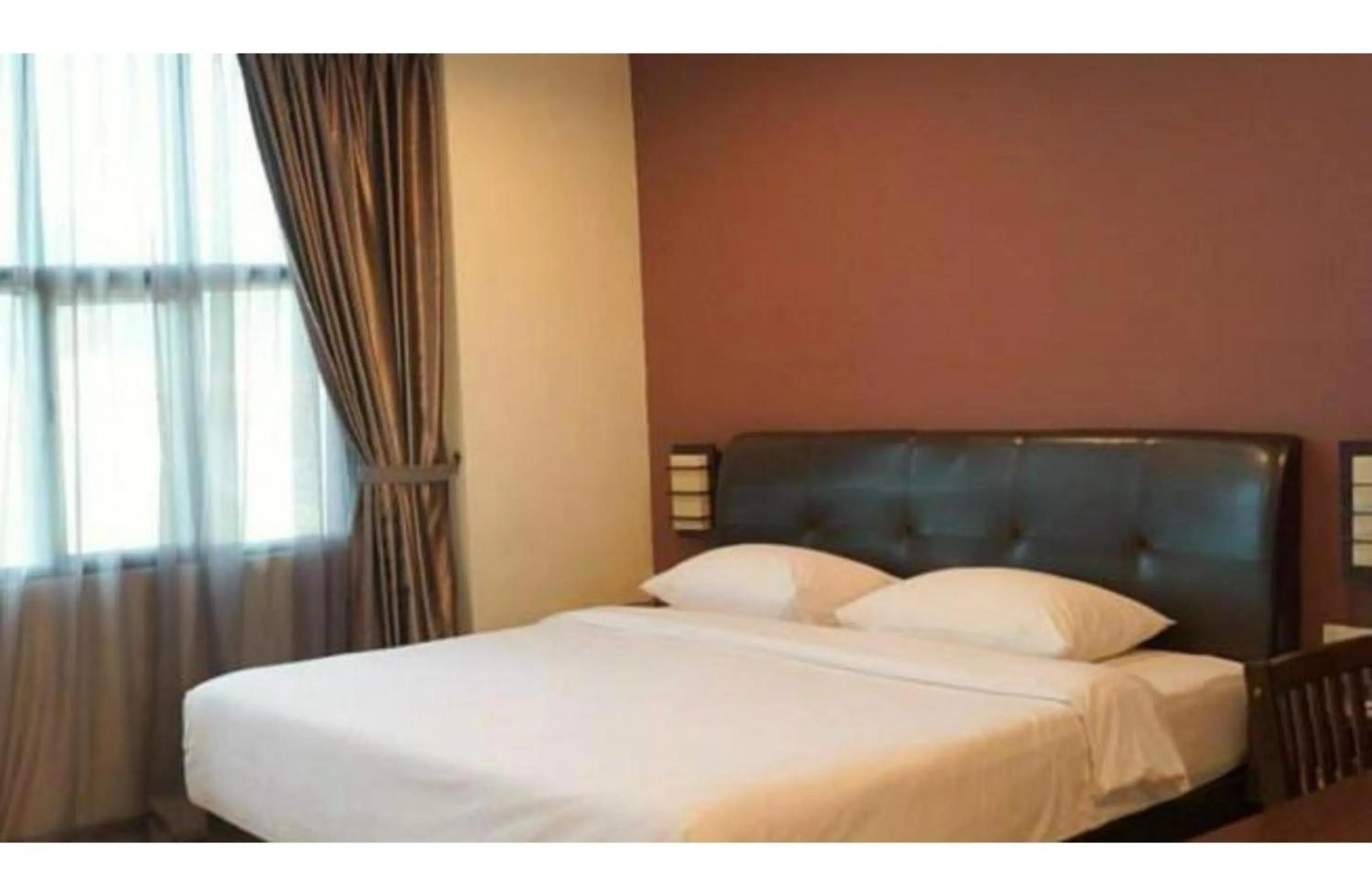 Photo of the whole room, Bed in Capital O Rail Hotel