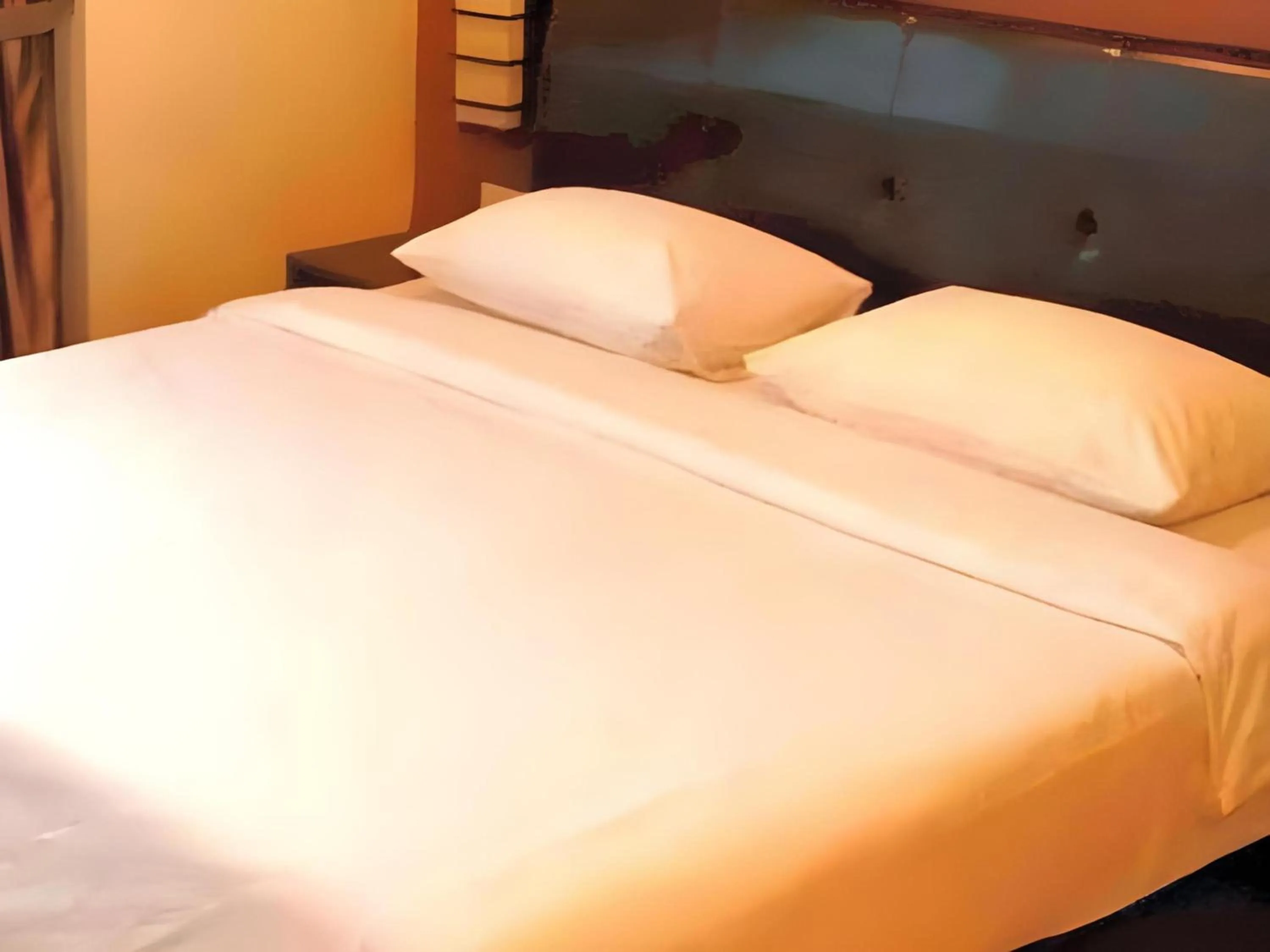 Photo of the whole room, Bed in Capital O Rail Hotel