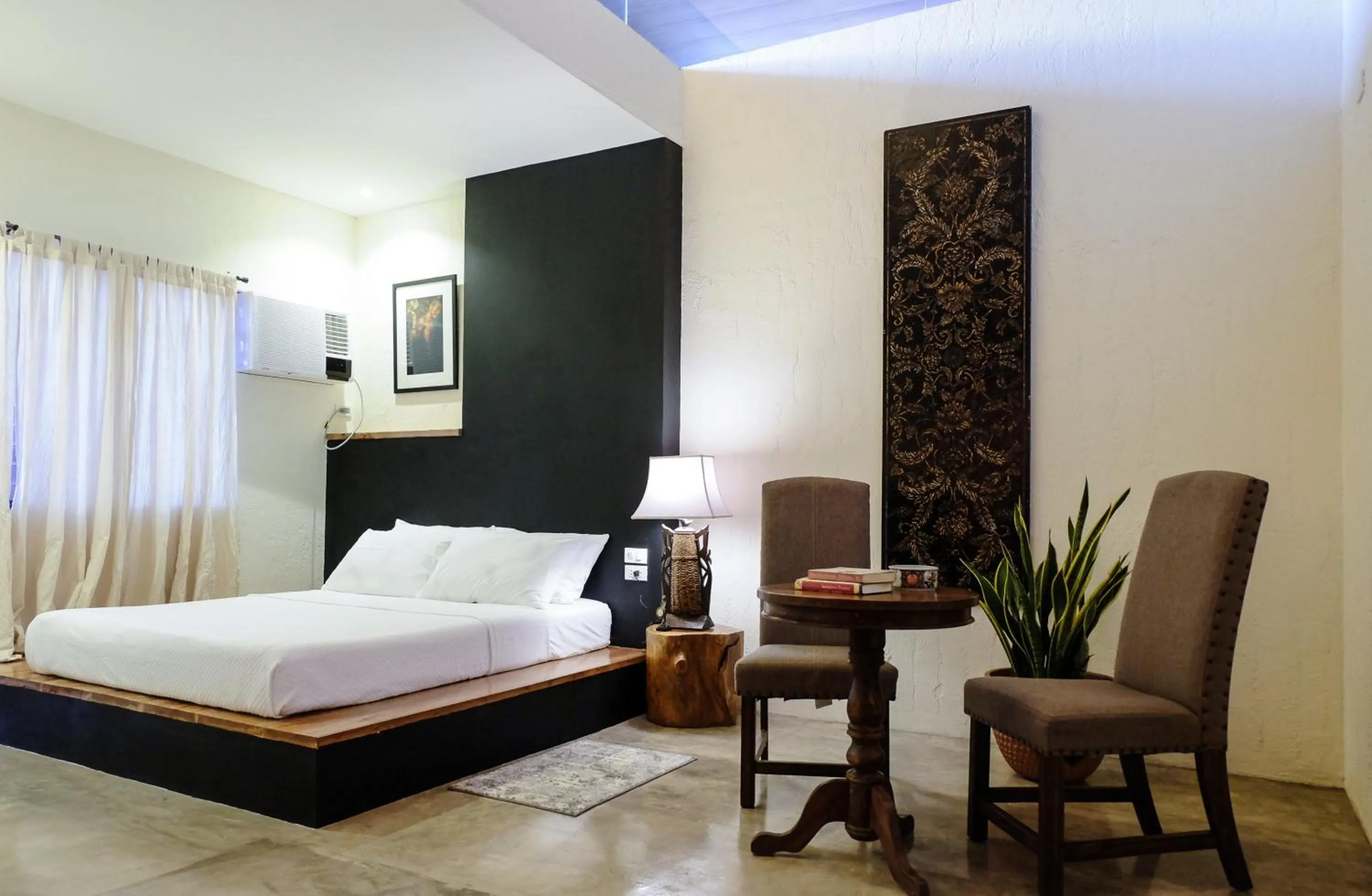 Bed in Ceda Guest House by HiveRooms