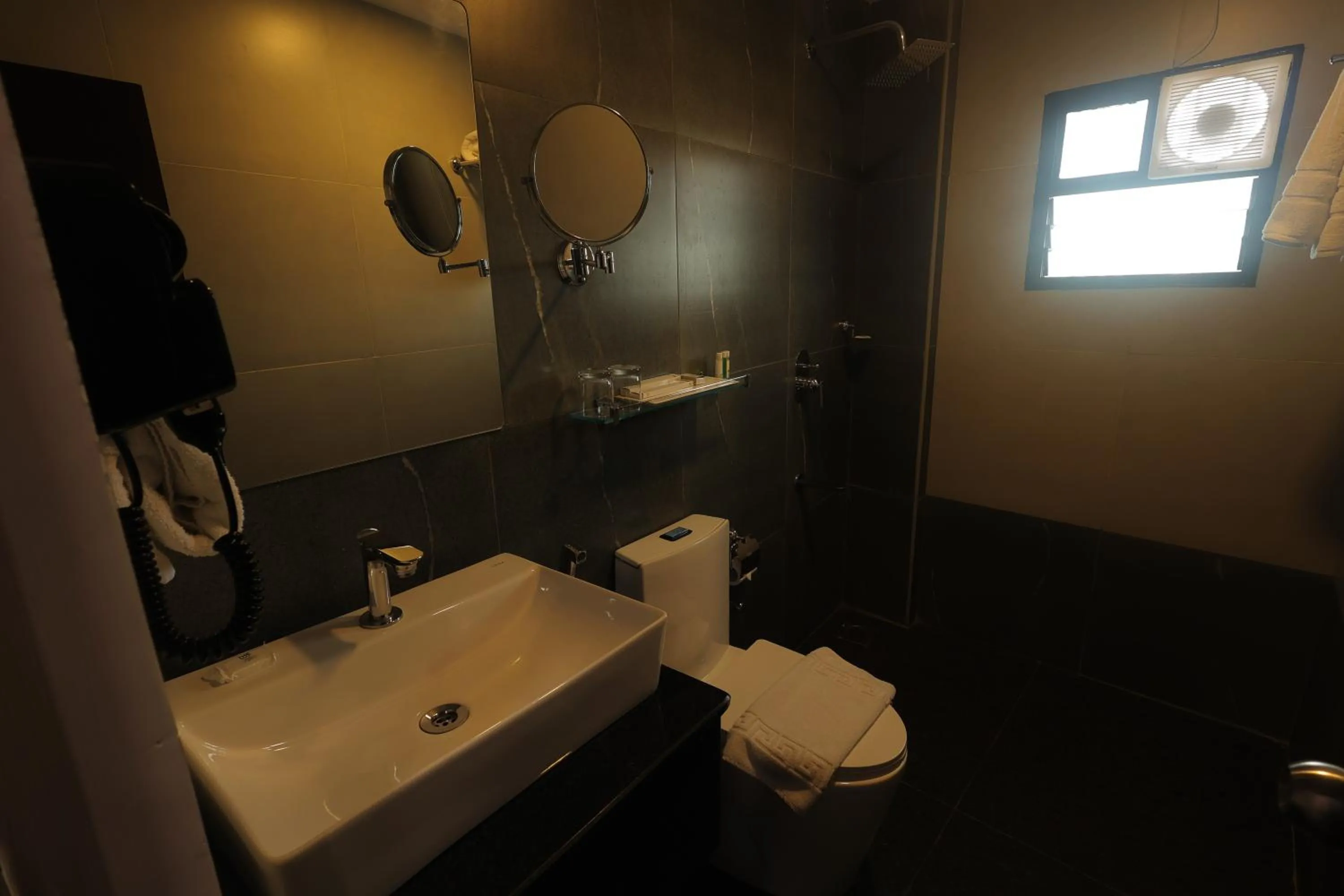 Shower in MJ Avyanna Resort & Convention Centre, Bengaluru