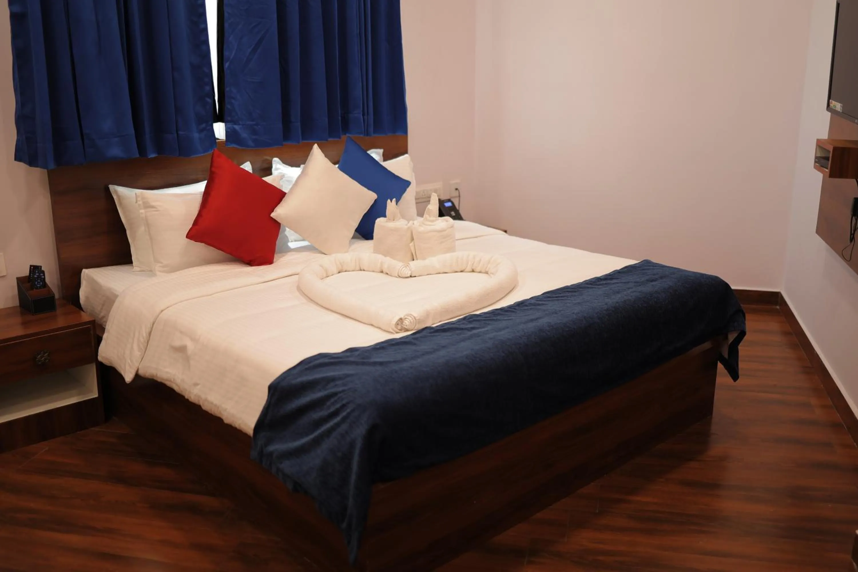 Photo of the whole room, Bed in MJ Avyanna Resort & Convention Centre, Bengaluru