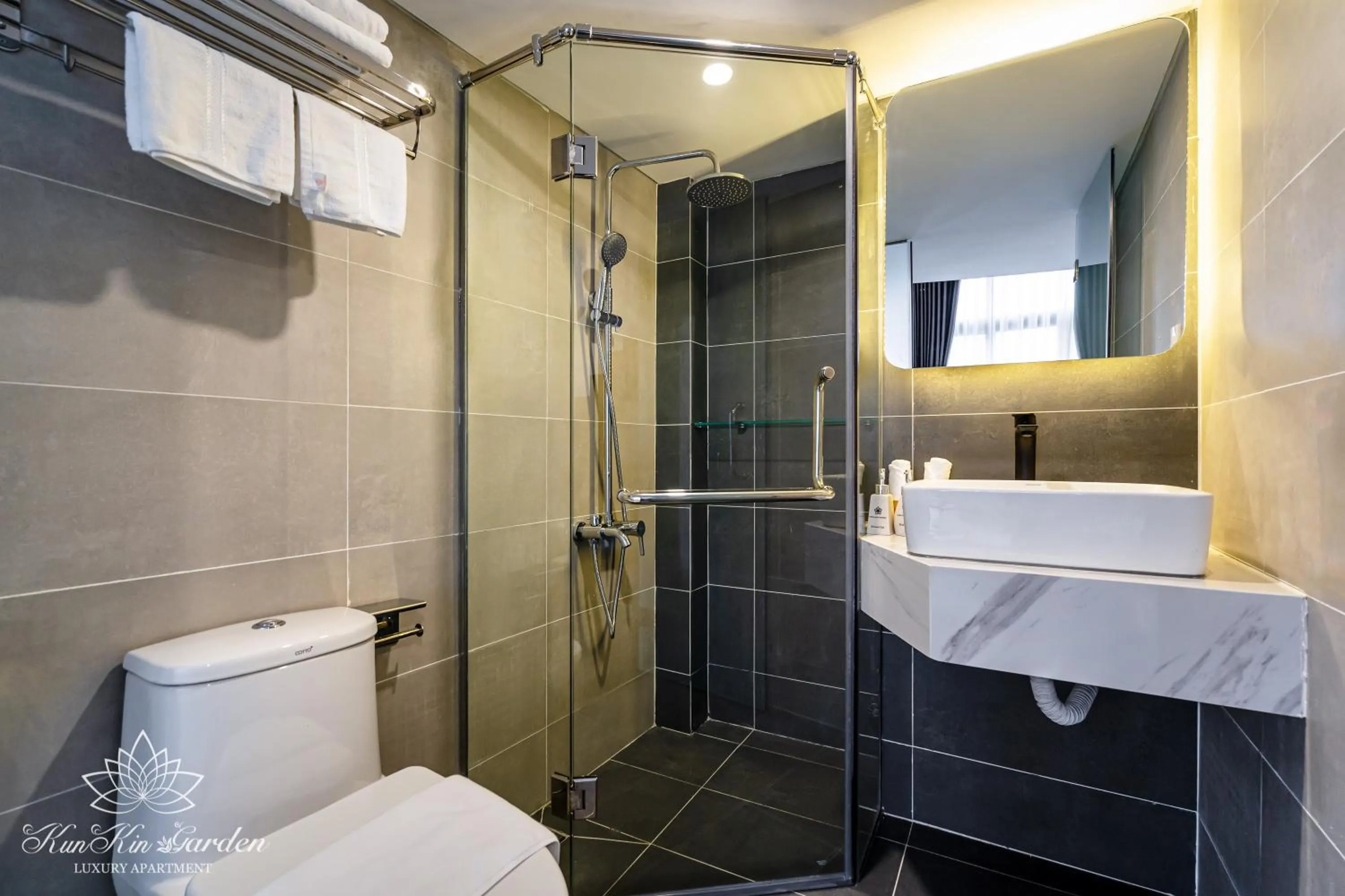 Shower in KunKin Garden Aparthotel