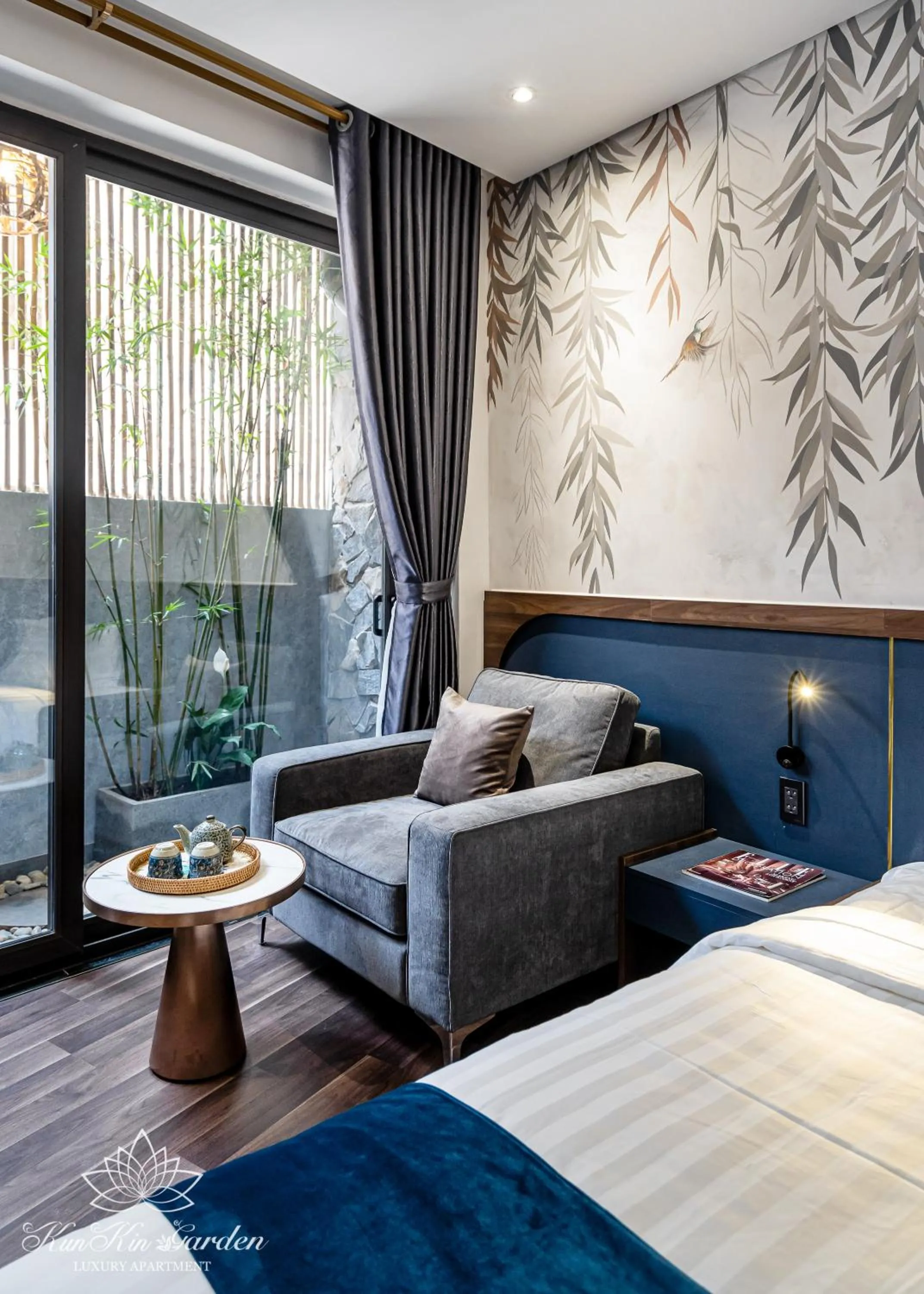 Seating area, Bed in KunKin Garden Aparthotel