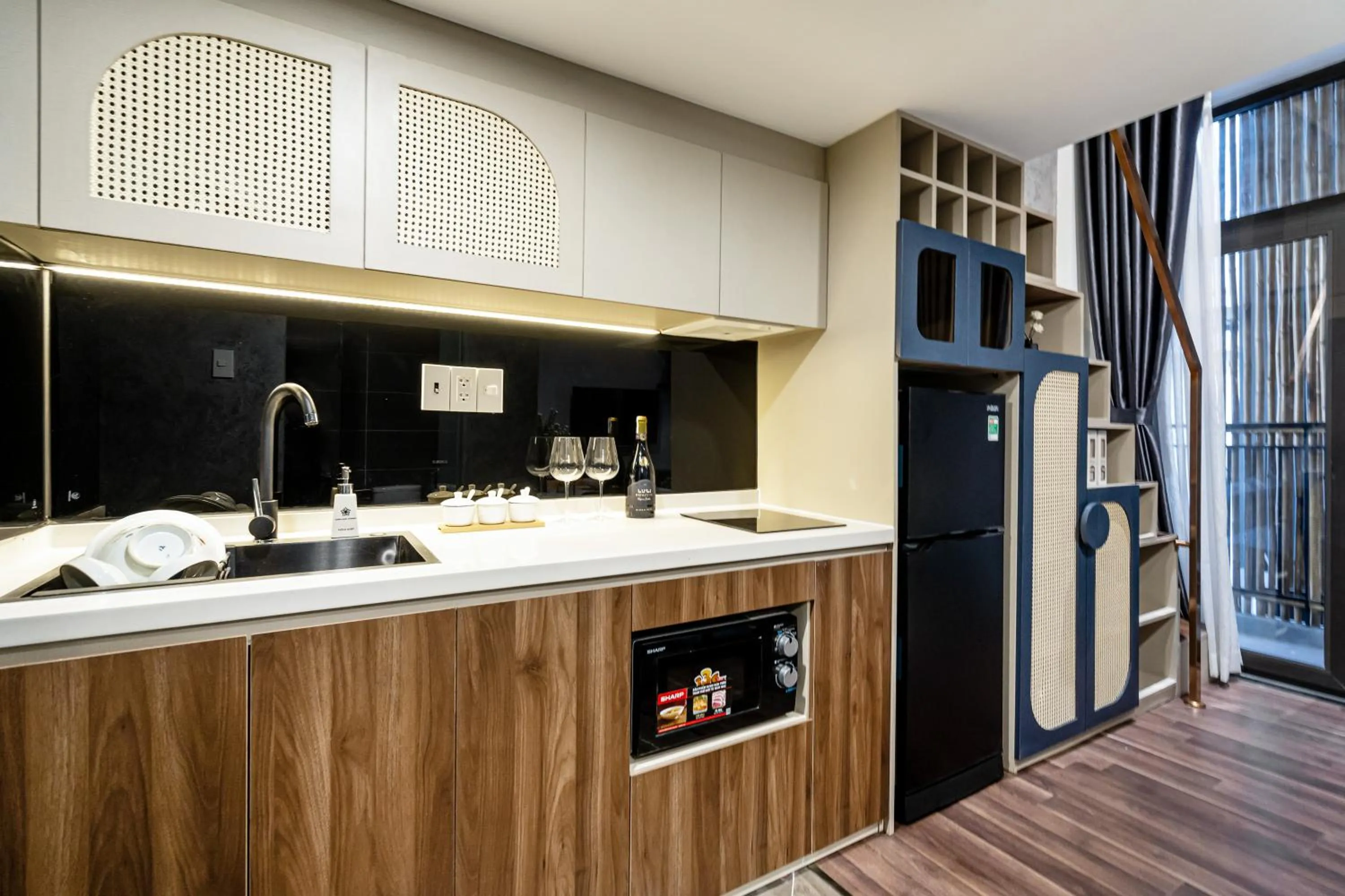 Kitchen or kitchenette in KunKin Garden Aparthotel