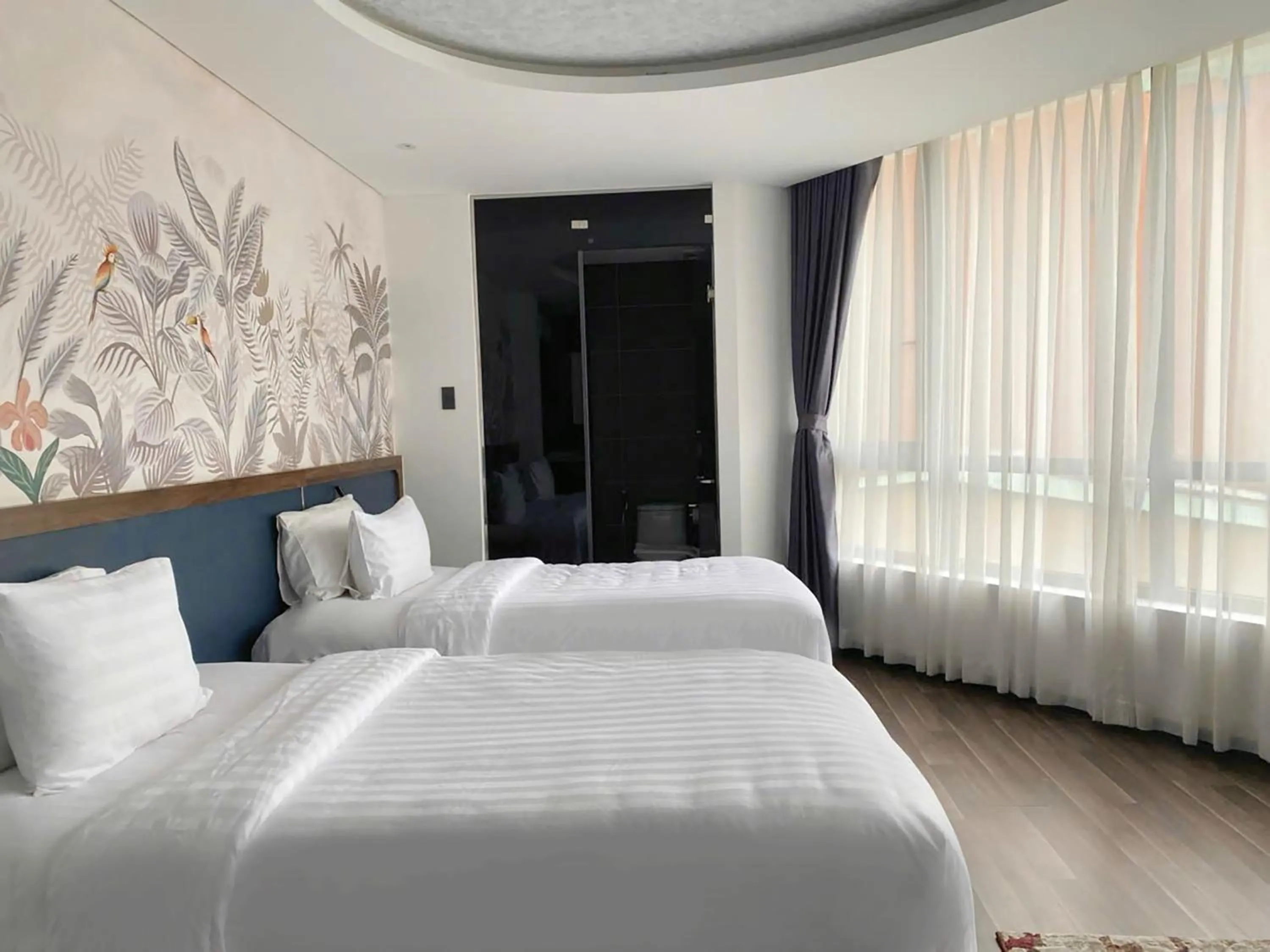 Bed in KunKin Garden Aparthotel