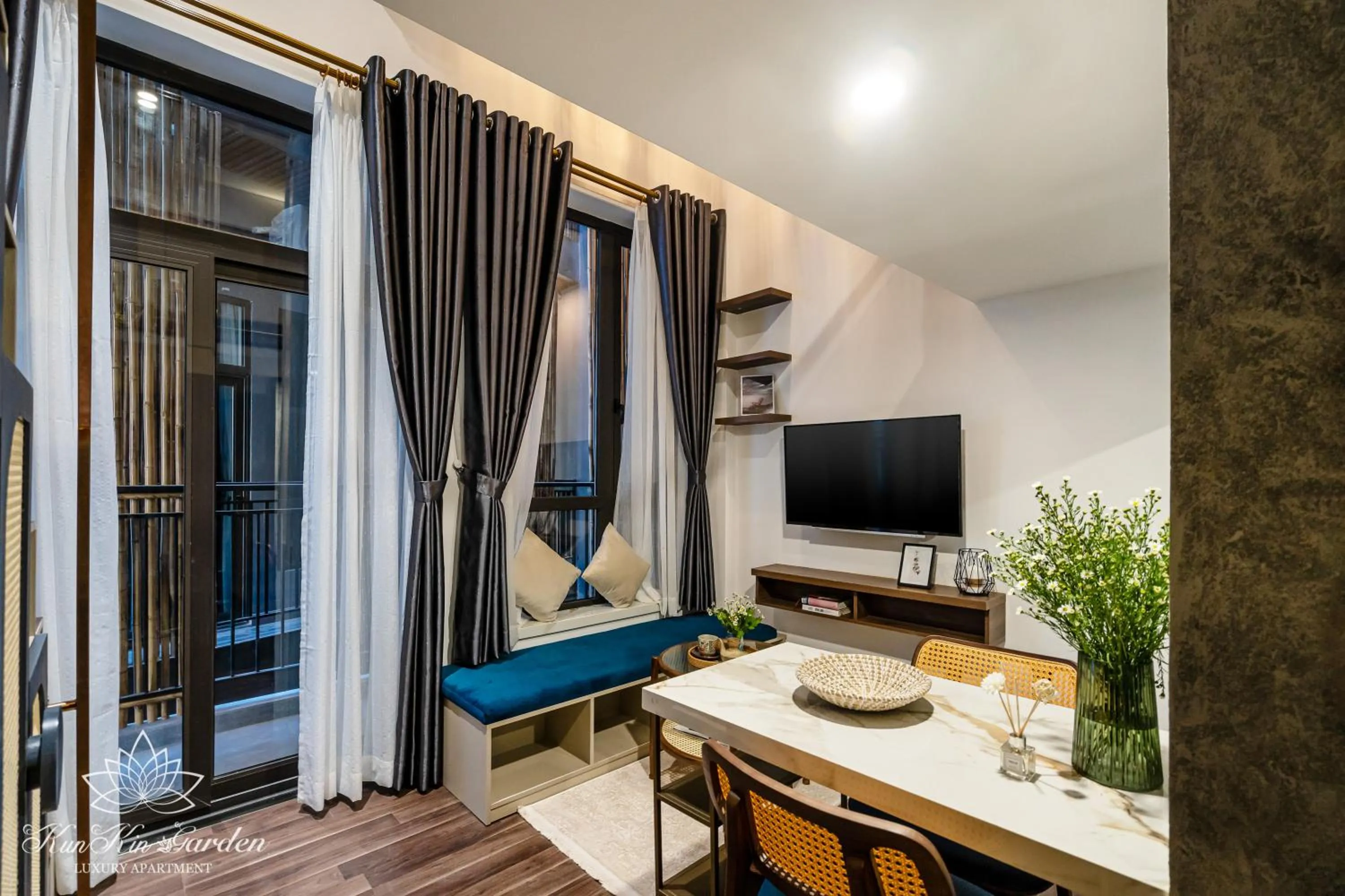 Communal lounge/ TV room in KunKin Garden Aparthotel