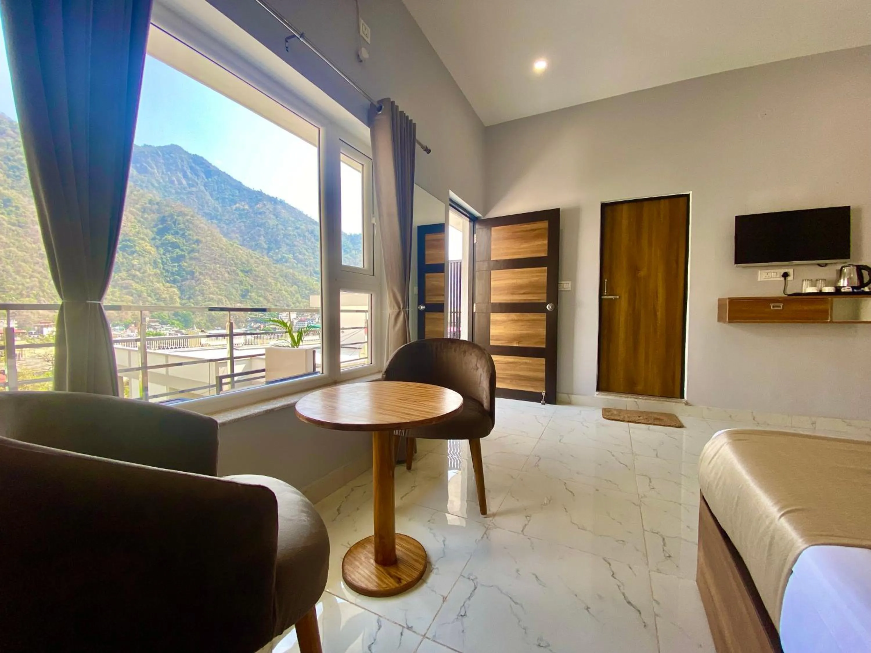 Communal lounge/ TV room in Hotel Wraveler Inn