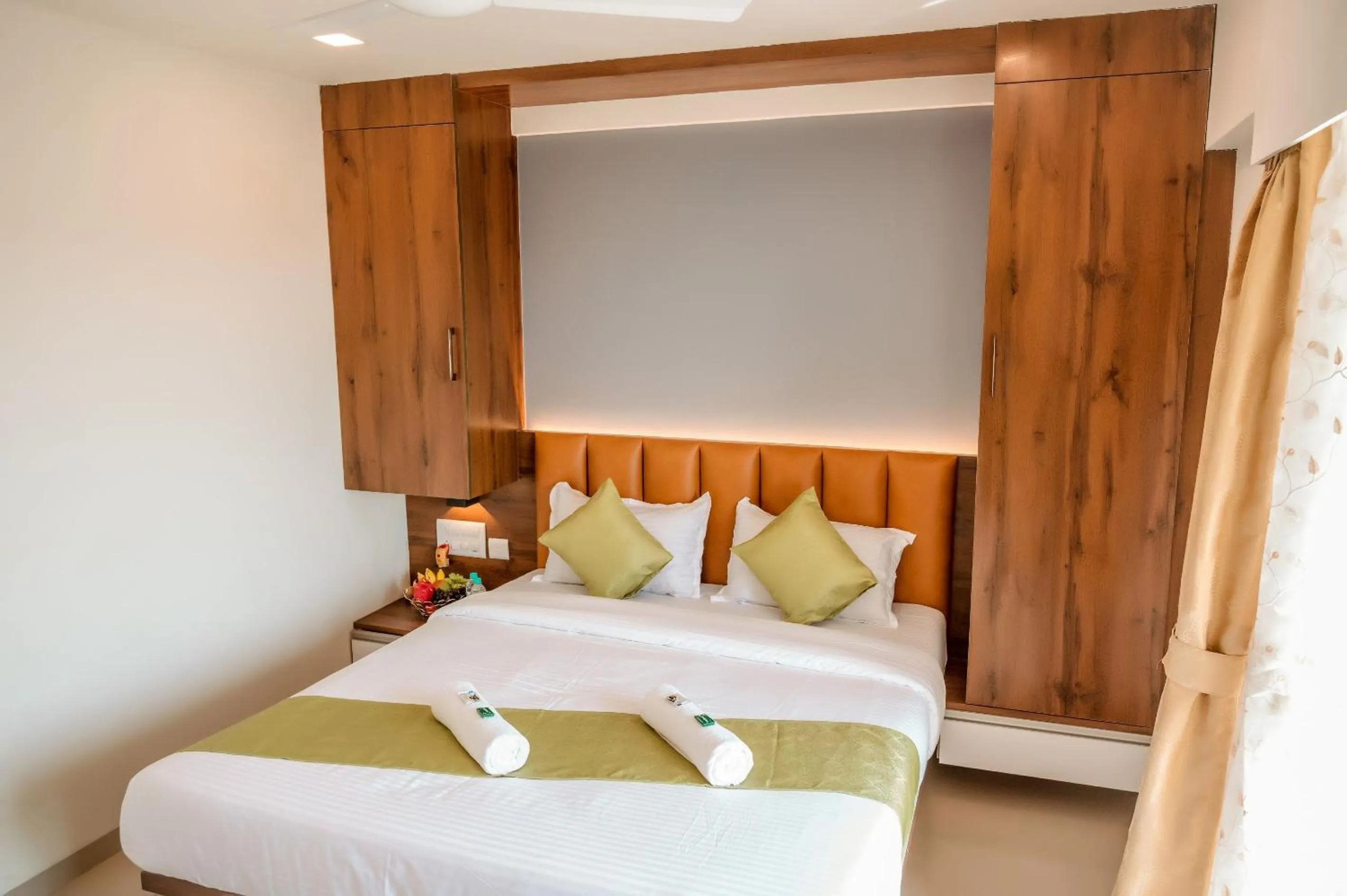 Bed in Hotel Heraa International