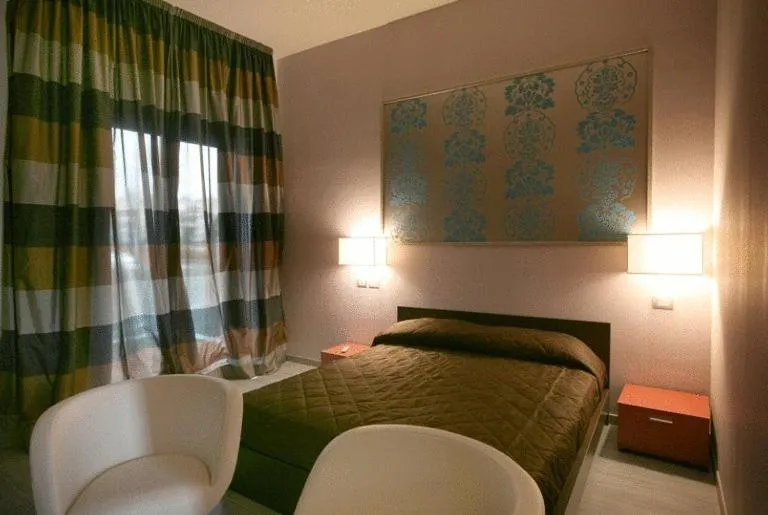 Photo of the whole room, Bed in Residence San Marino