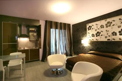 Photo of the whole room, Bed in Residence San Marino