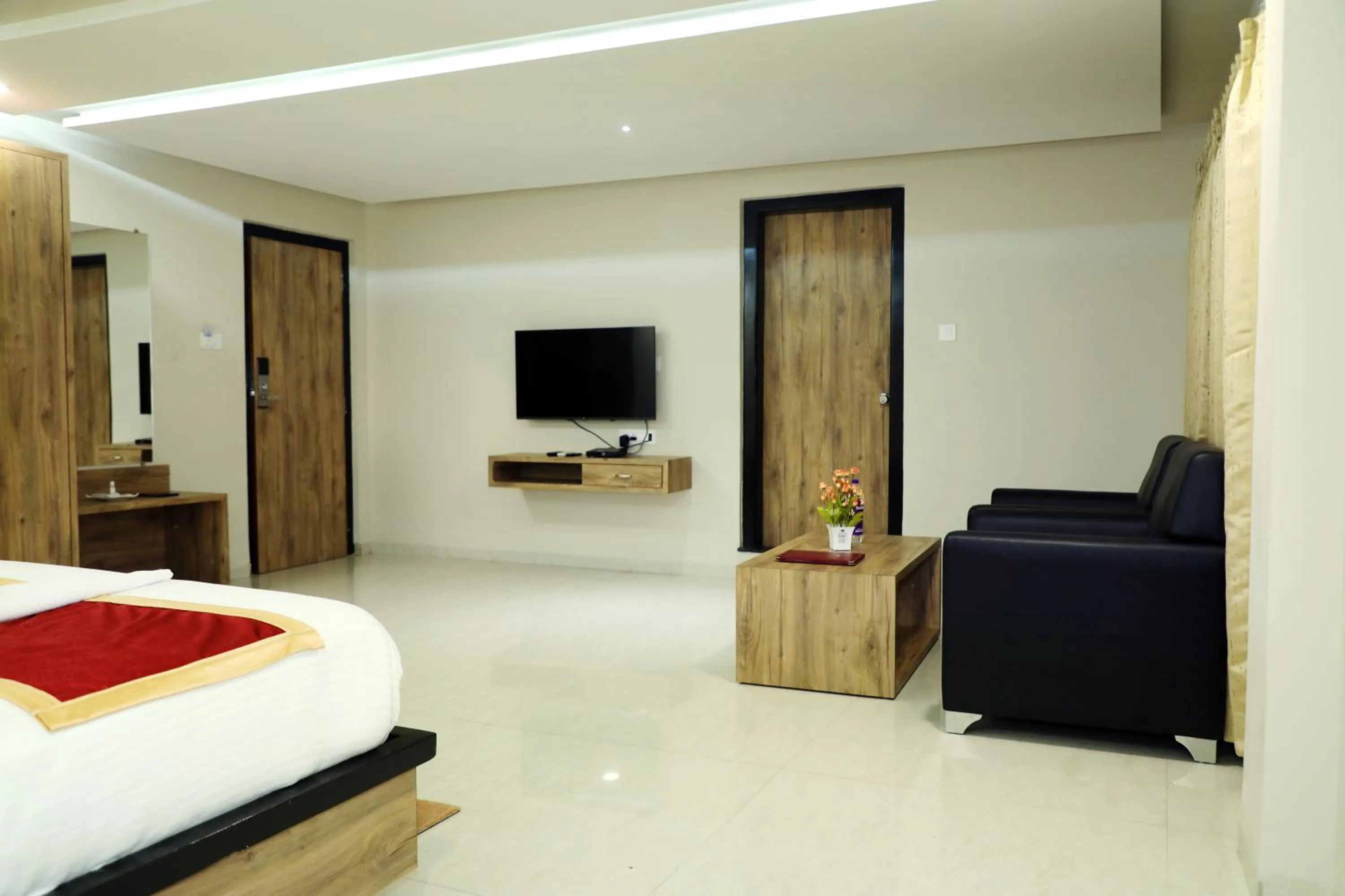 TV and multimedia, Bed in VOV Hotels Vijayapura
