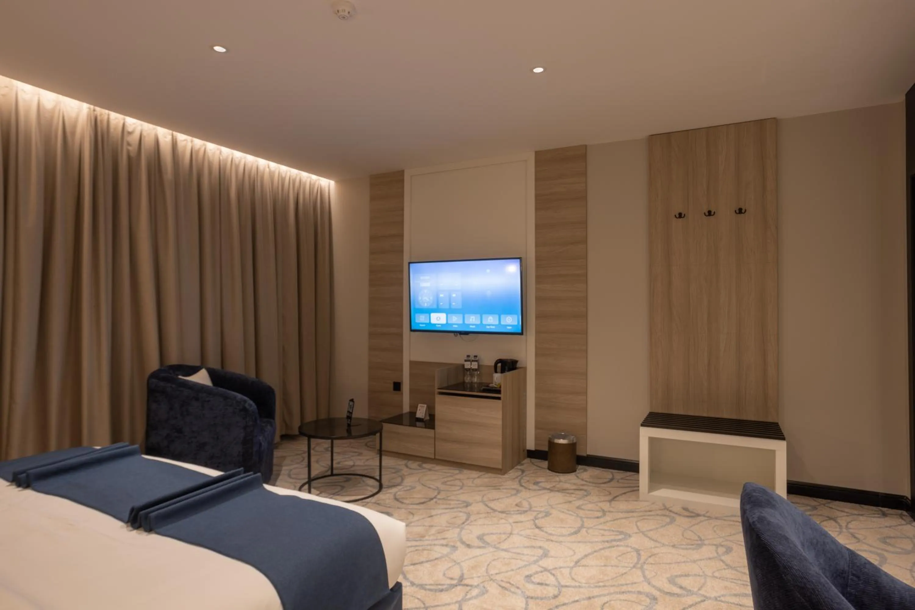 Bed in Skyline Hotel & Suites