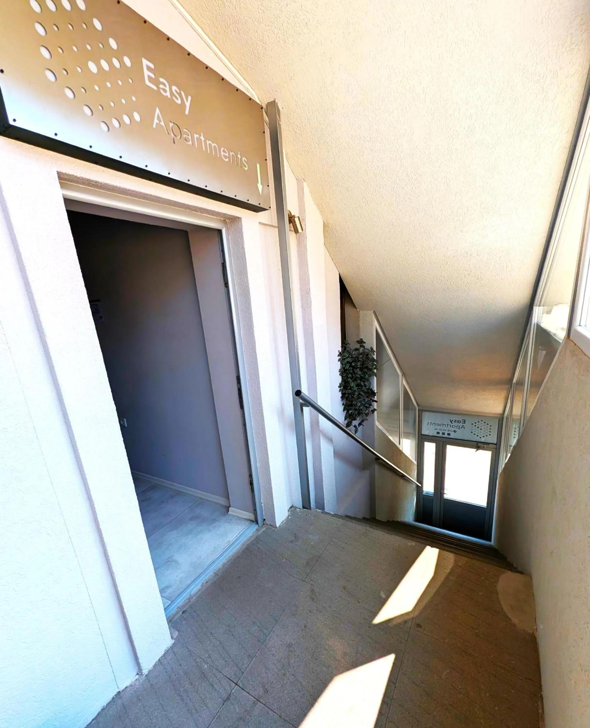 Property building in Easy Apartments