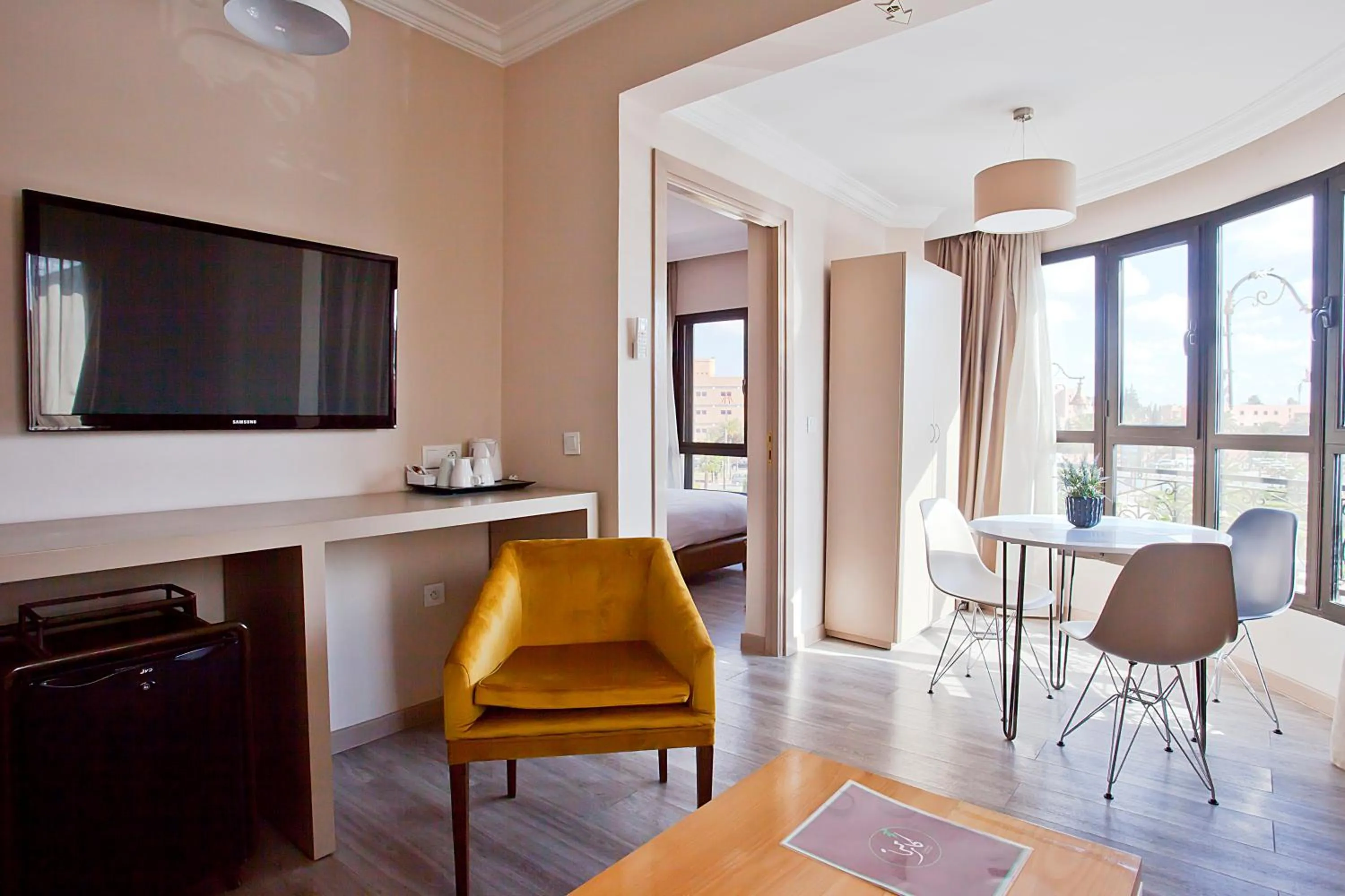 Communal lounge/ TV room in Amani Hotel Suites & Spa