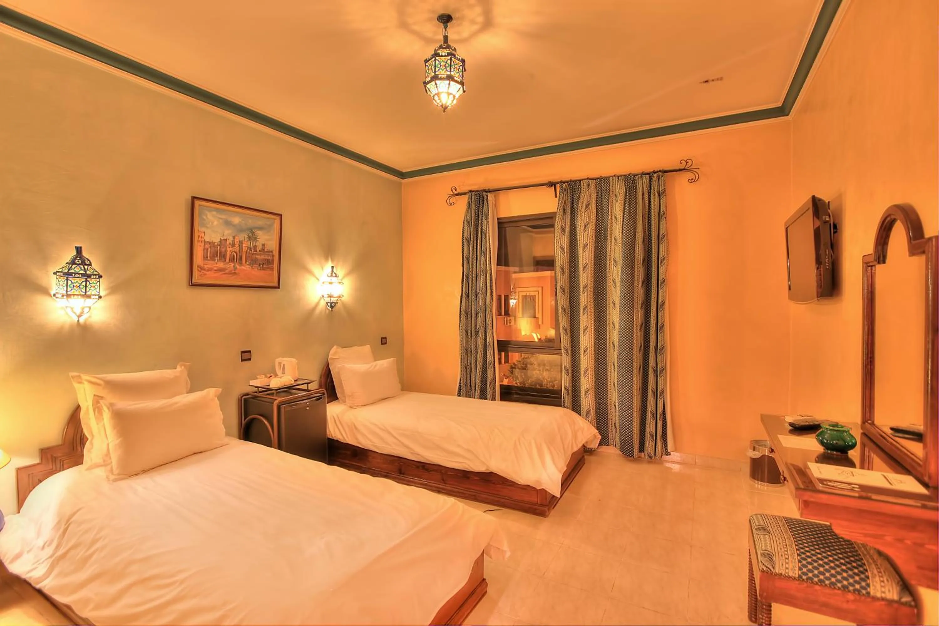 Bed in Amani Hotel Suites & Spa