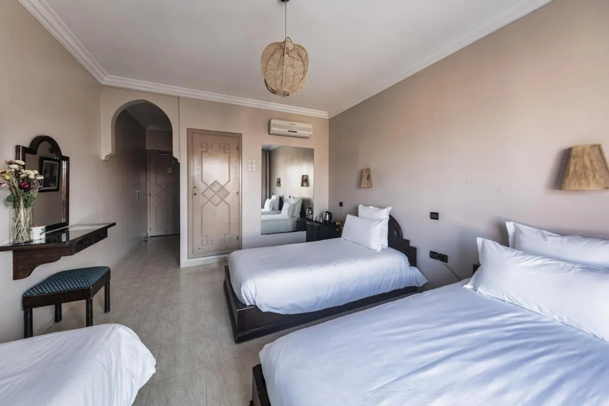 Bed in Amani Hotel Suites & Spa