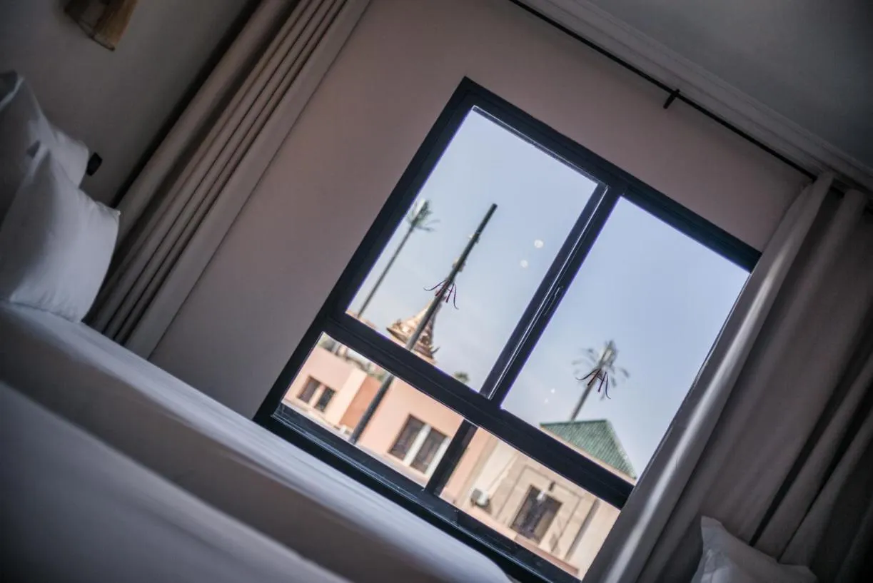 Bed in Amani Hotel Suites & Spa