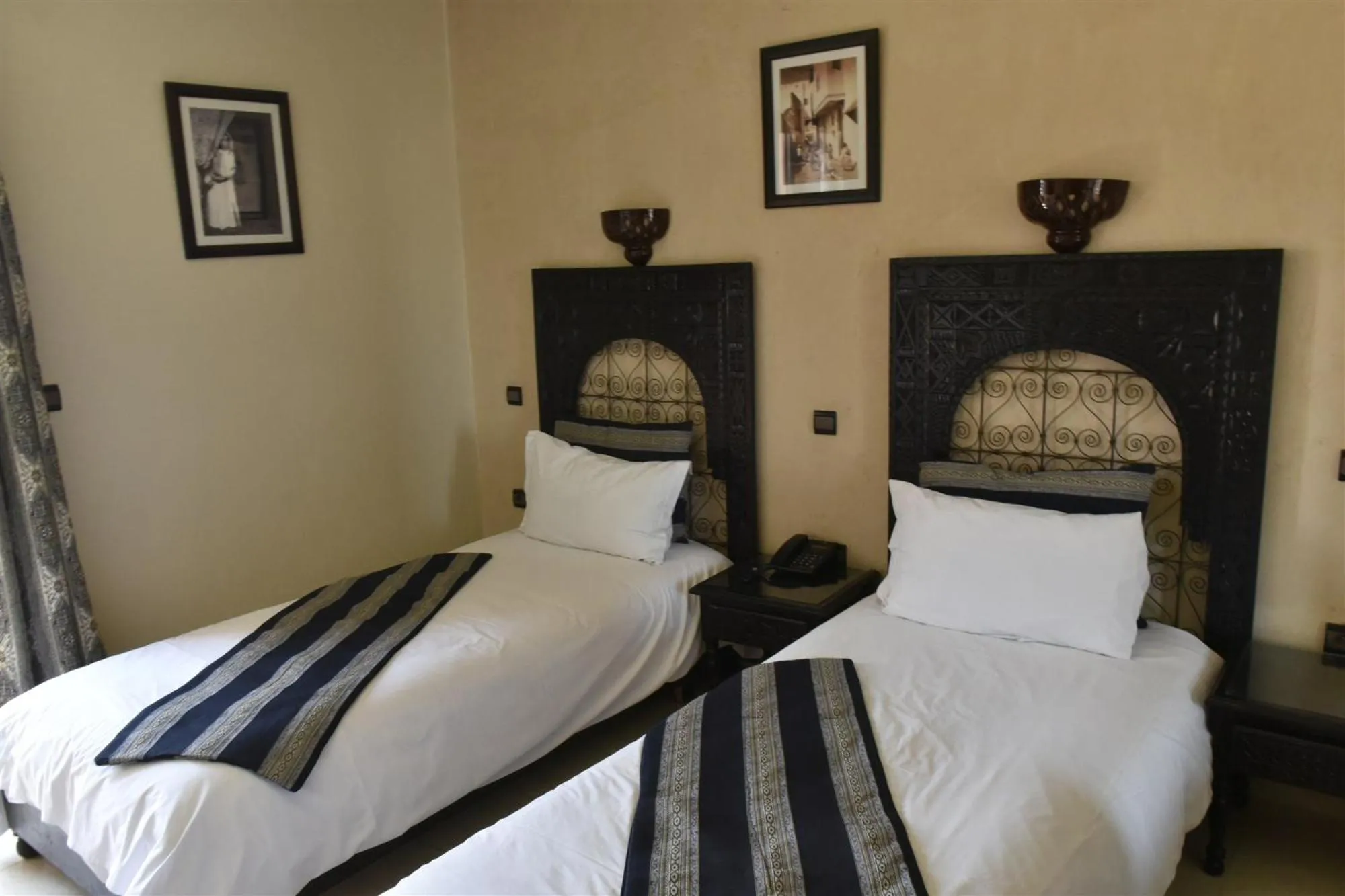 Bed in Amani Hotel Suites & Spa