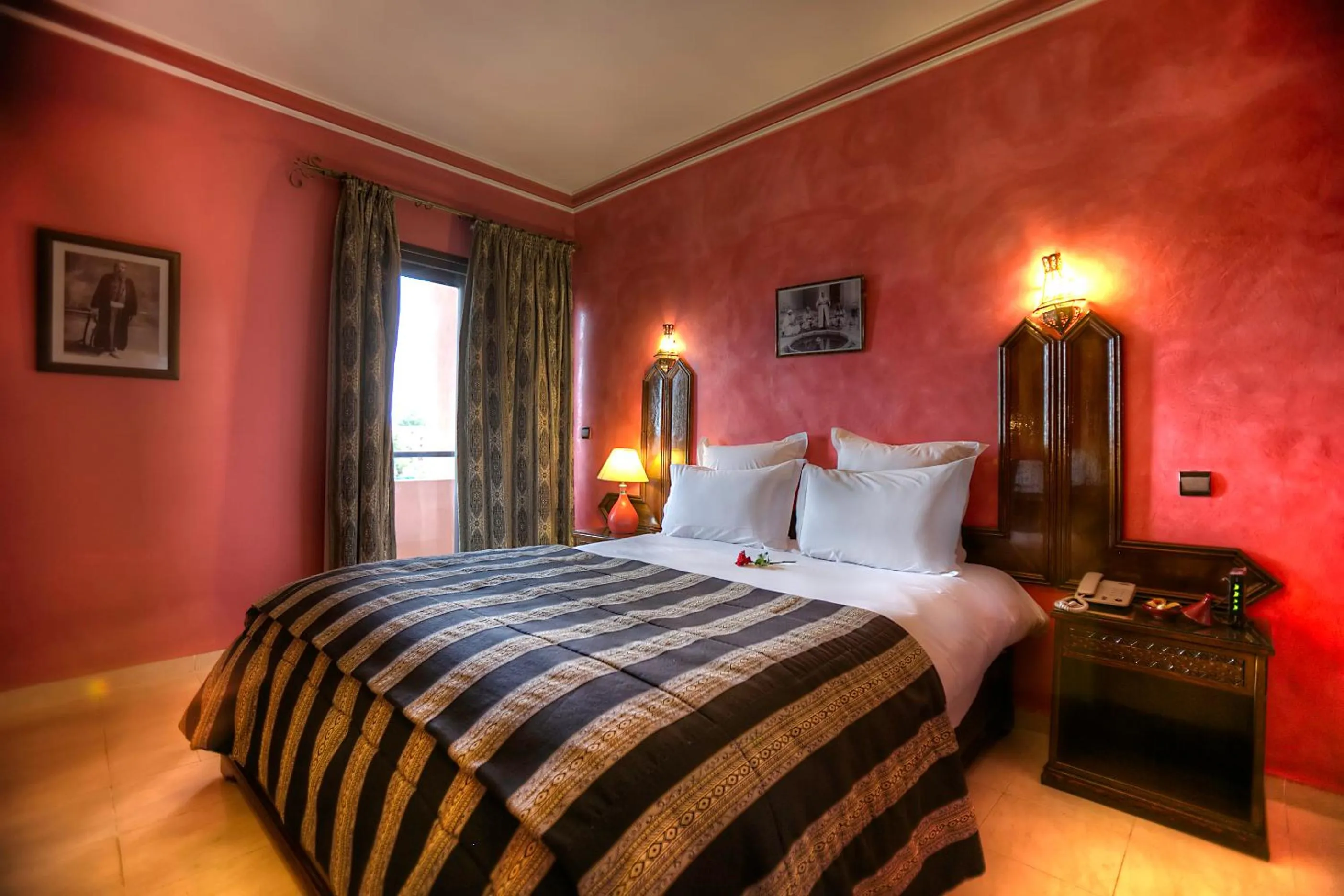 Photo of the whole room, Bed in Amani Hotel Suites & Spa