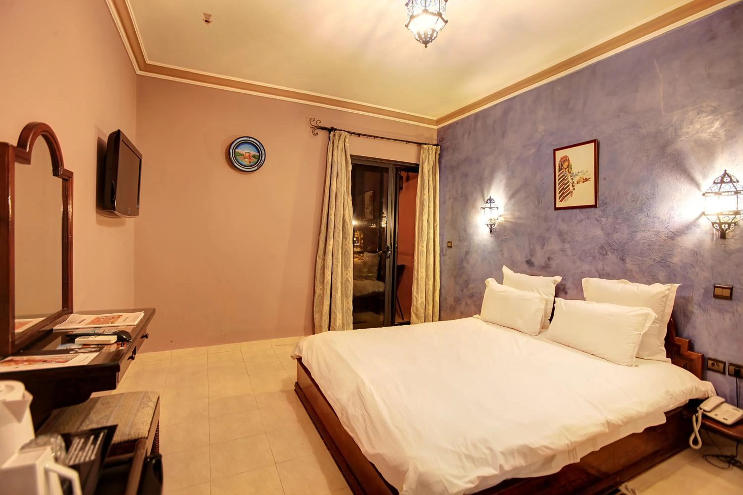 Bed in Amani Hotel Suites & Spa