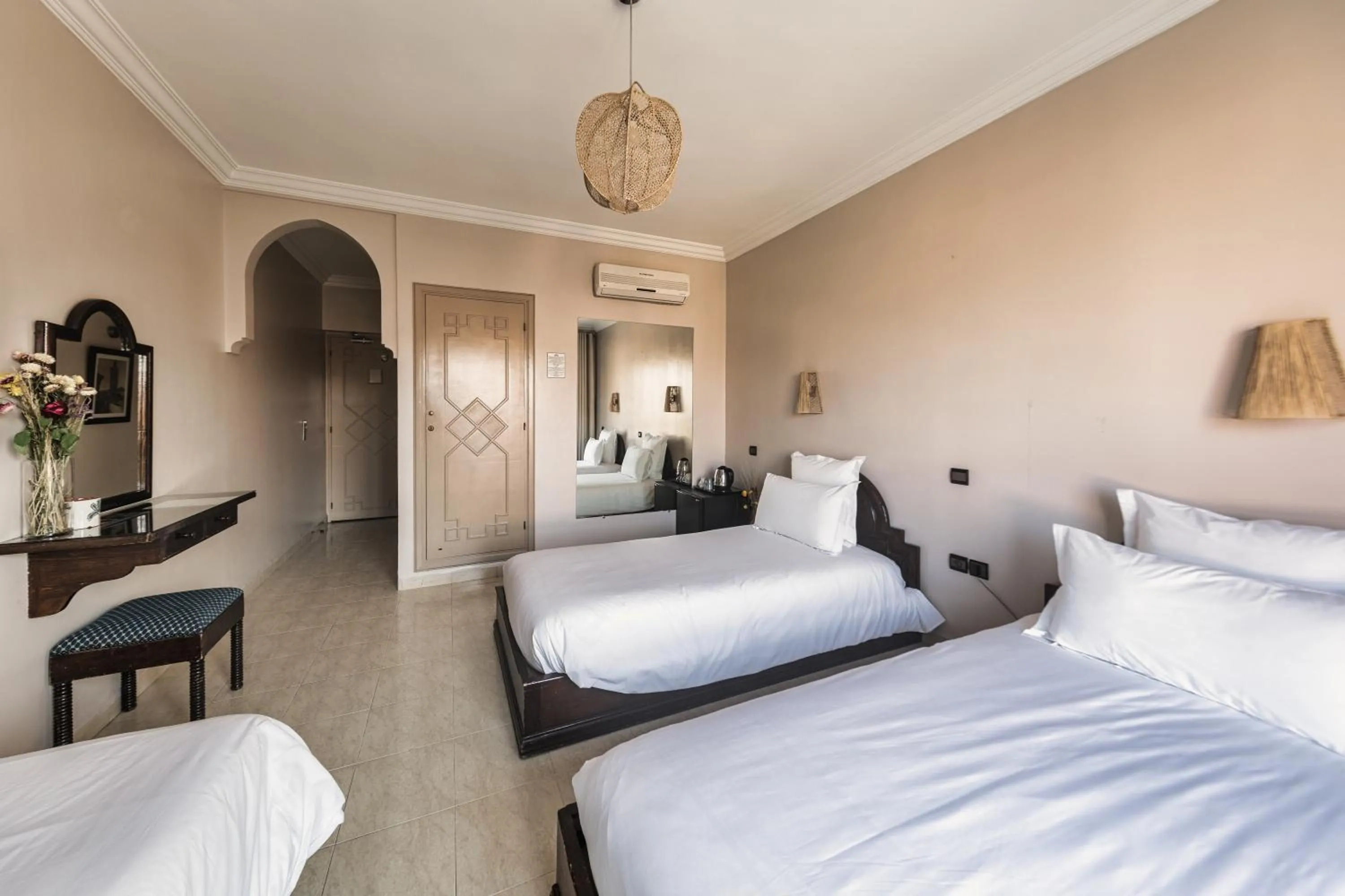 Bed in Amani Hotel Suites & Spa