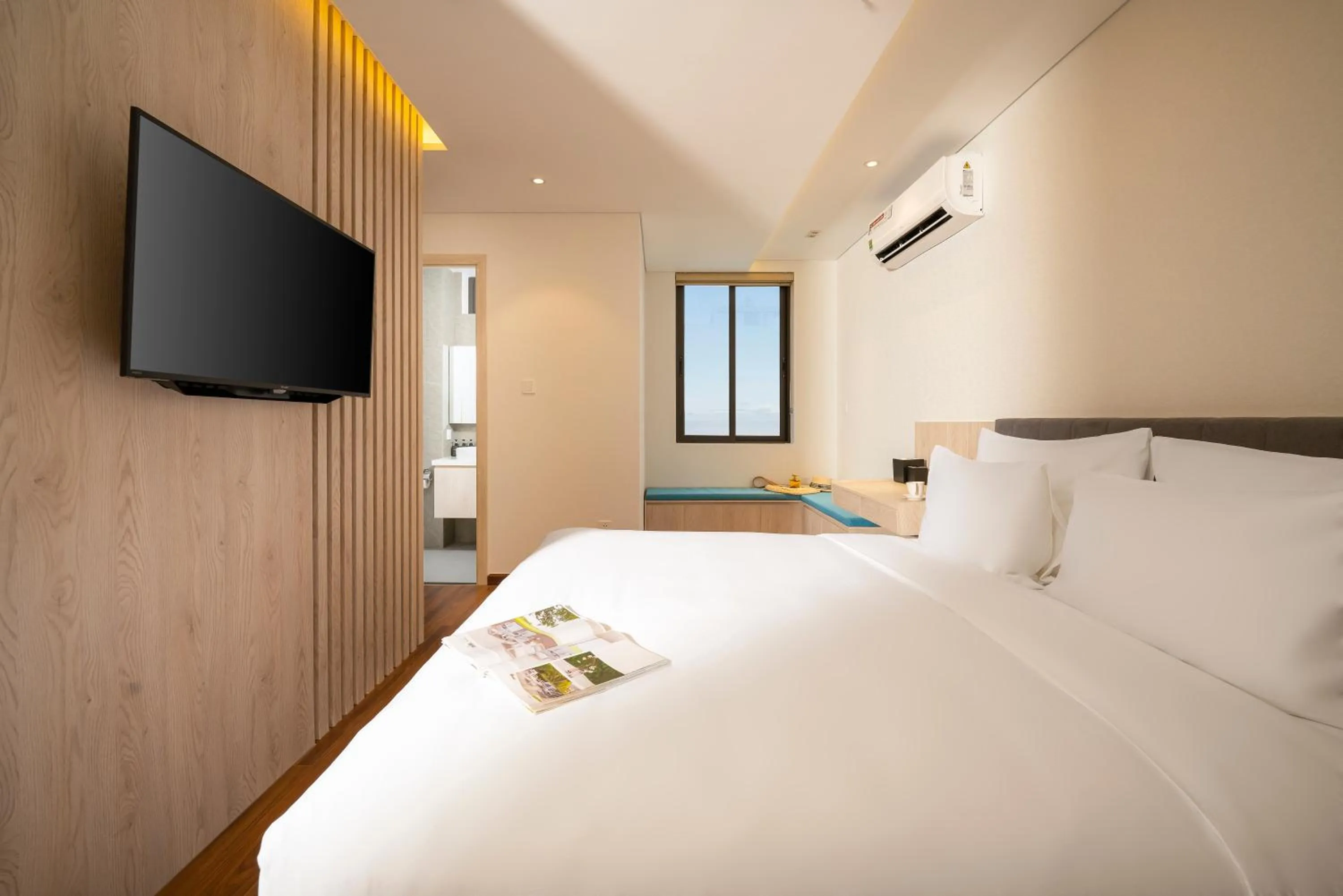 TV and multimedia, Bed in Tashi Ocean Garden & Apartment Da Nang - My Khe Beach