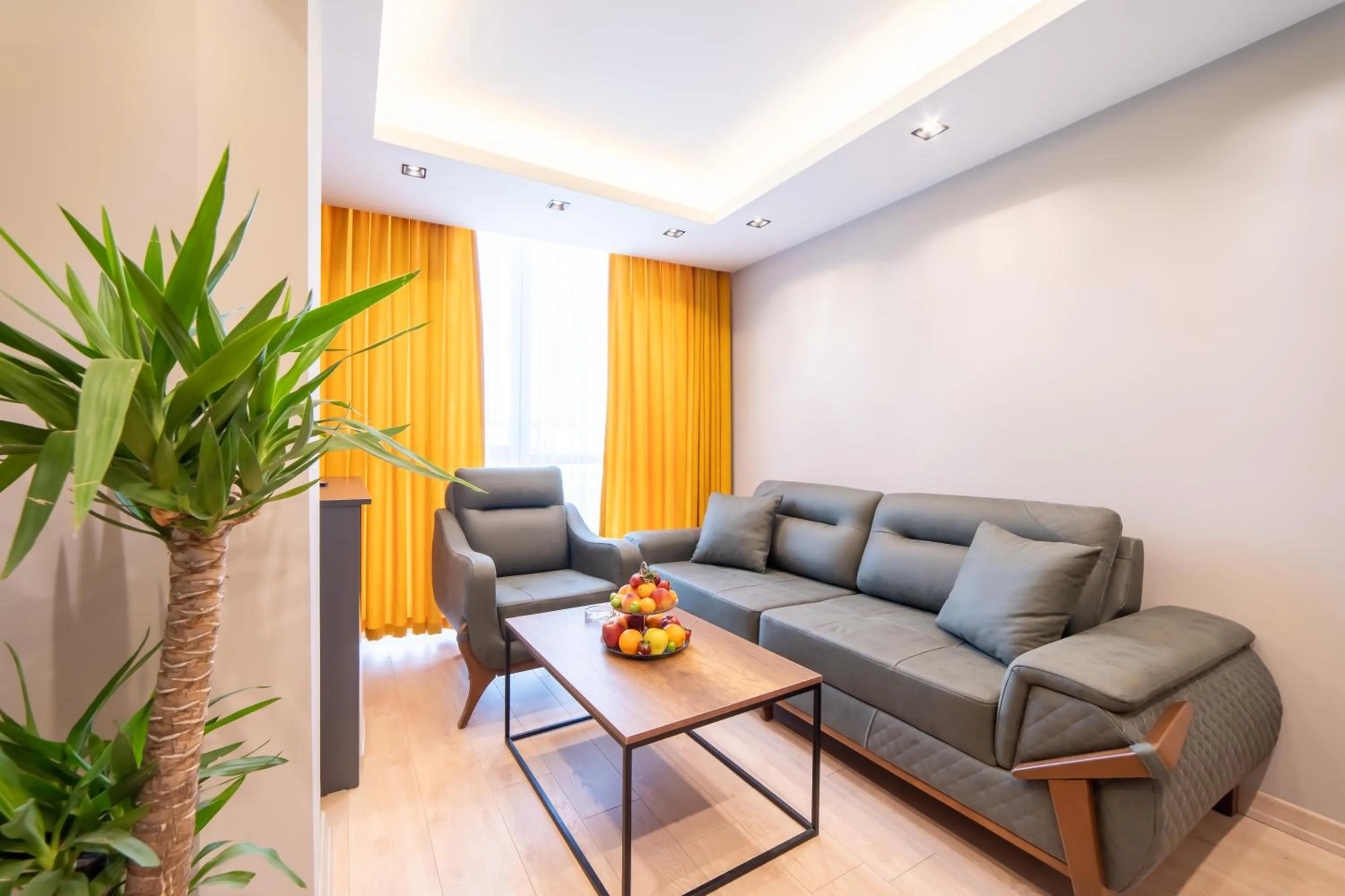 Living room in Garden Room Suit Hotel