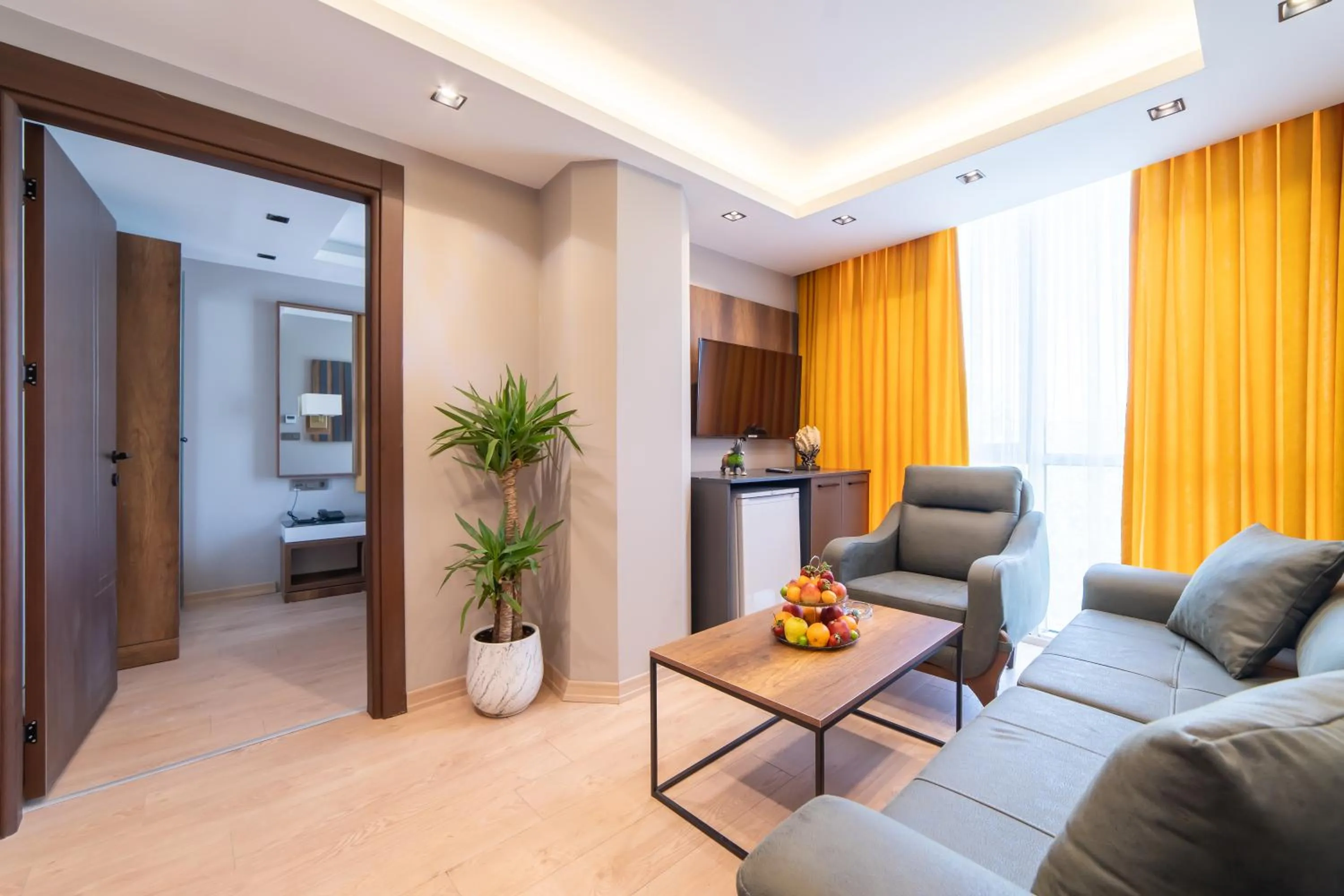 Living room in Garden Room Suit Hotel