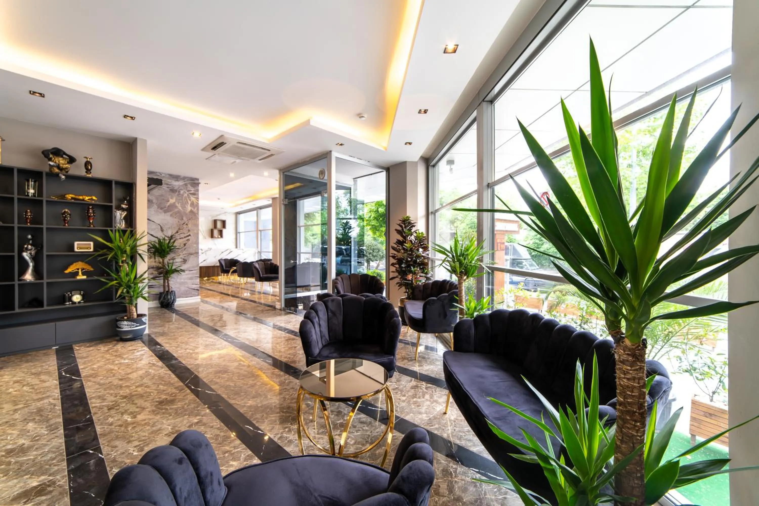 Lobby or reception in Garden Room Suit Hotel