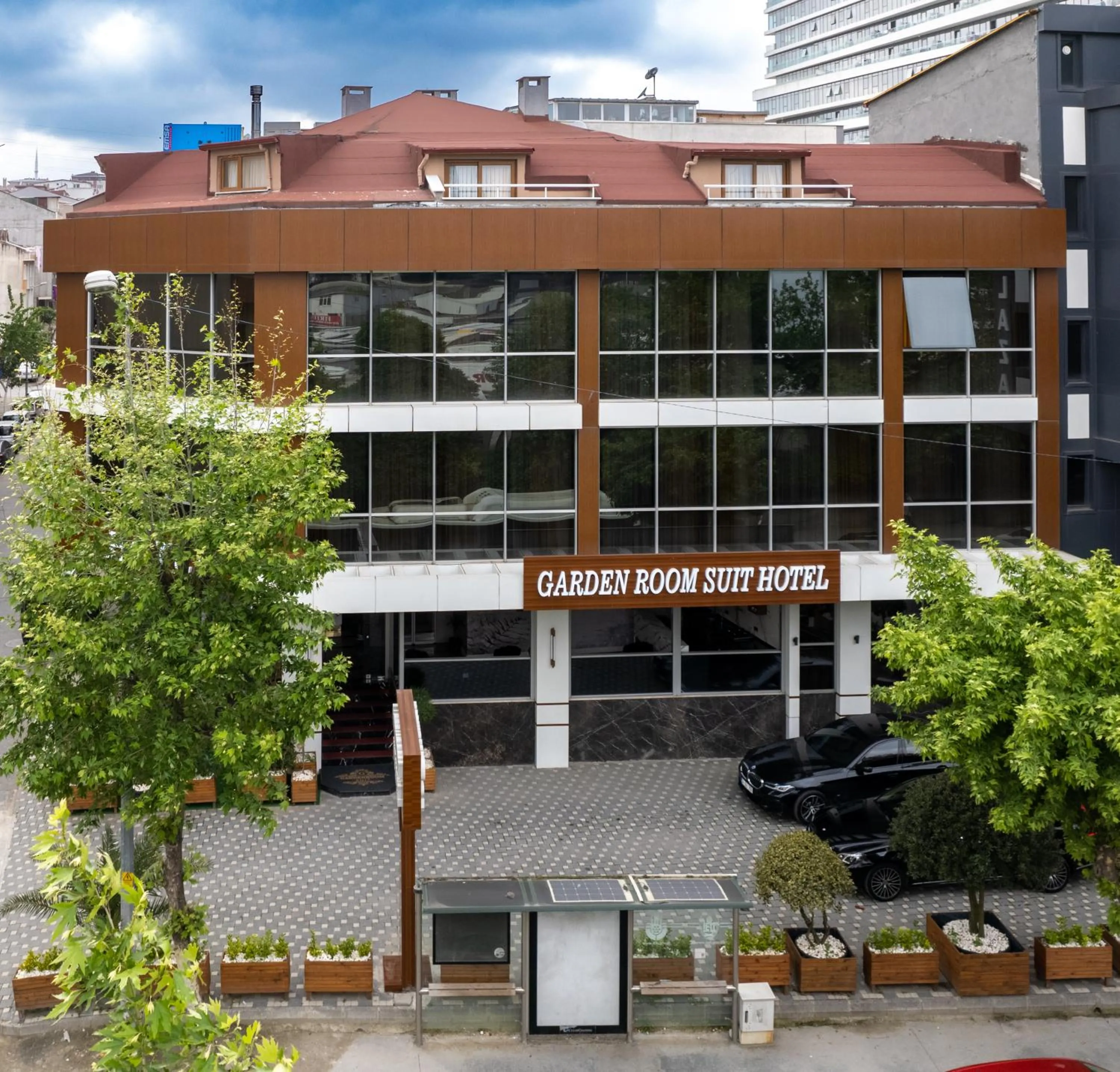 Property building in Garden Room Suit Hotel