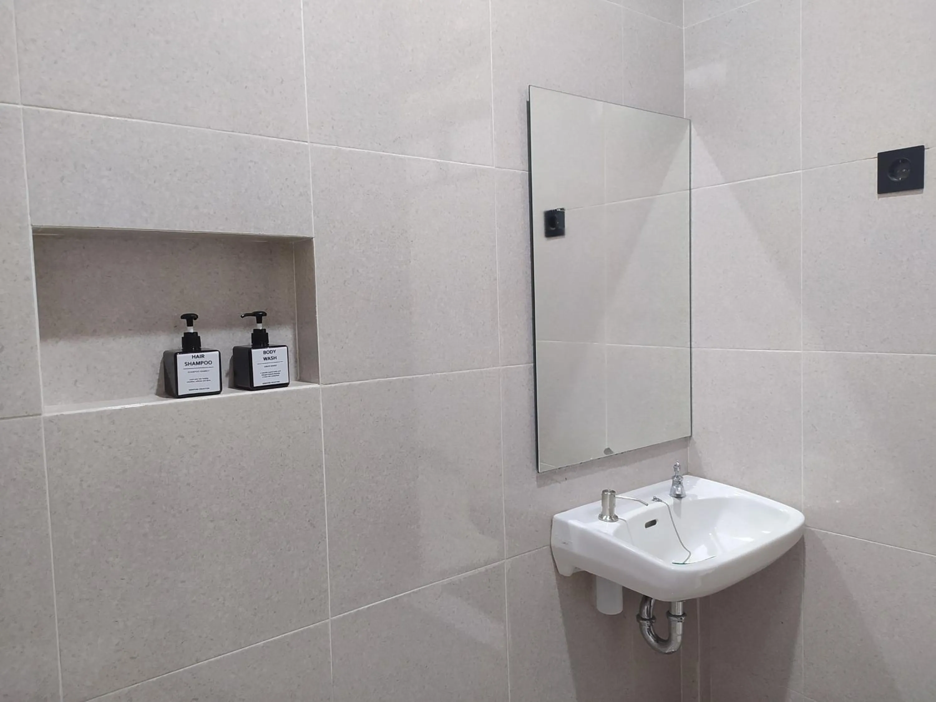 Bathroom in Urbanview Badran Residence Syariah Manahan