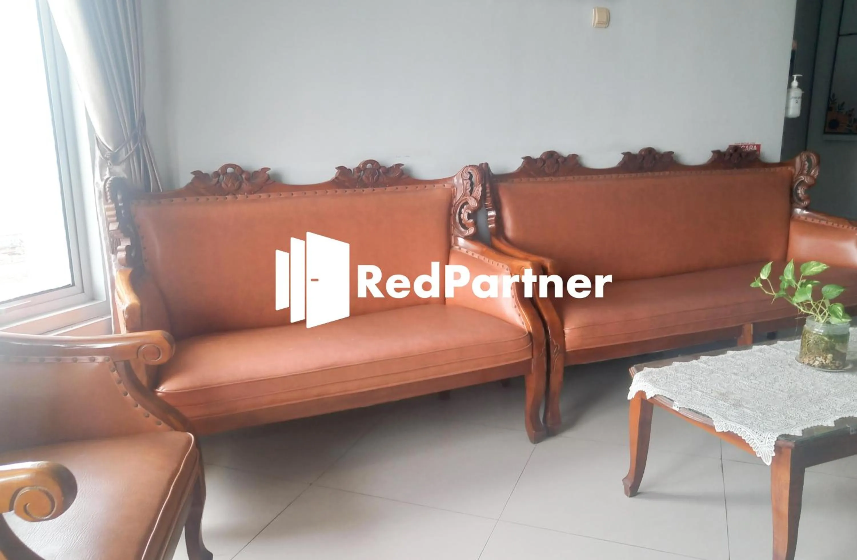 Seating area in Riyani Residence At Jalan Ahmad Yani Pemalang Mitra RedDoorz