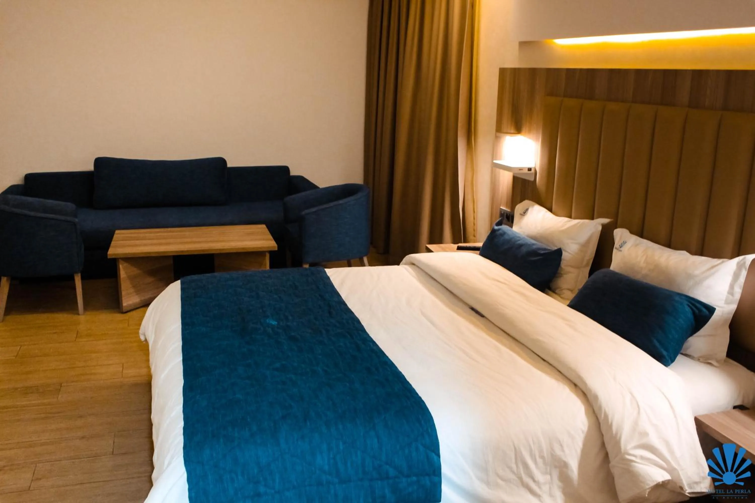 Bed in Hôtel La Perla