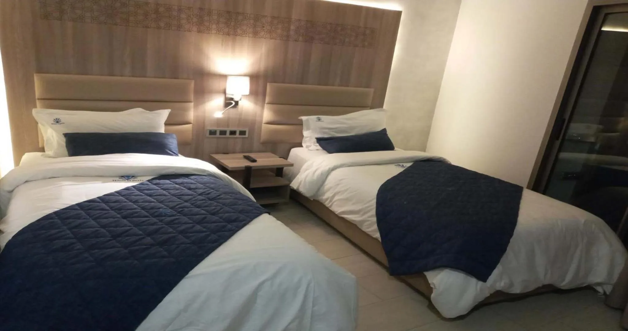 Bed in Hôtel La Perla